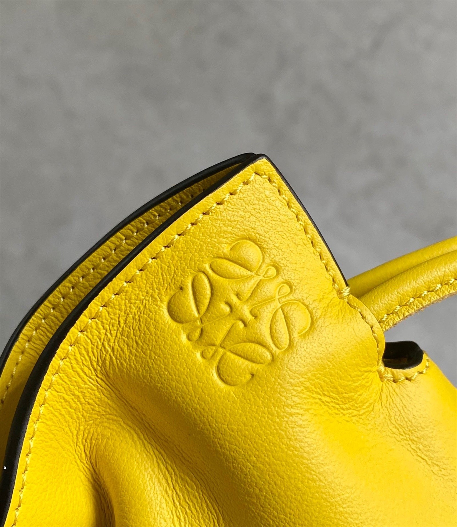 L0ew* flamenco nano clutch in yellow nappa leather