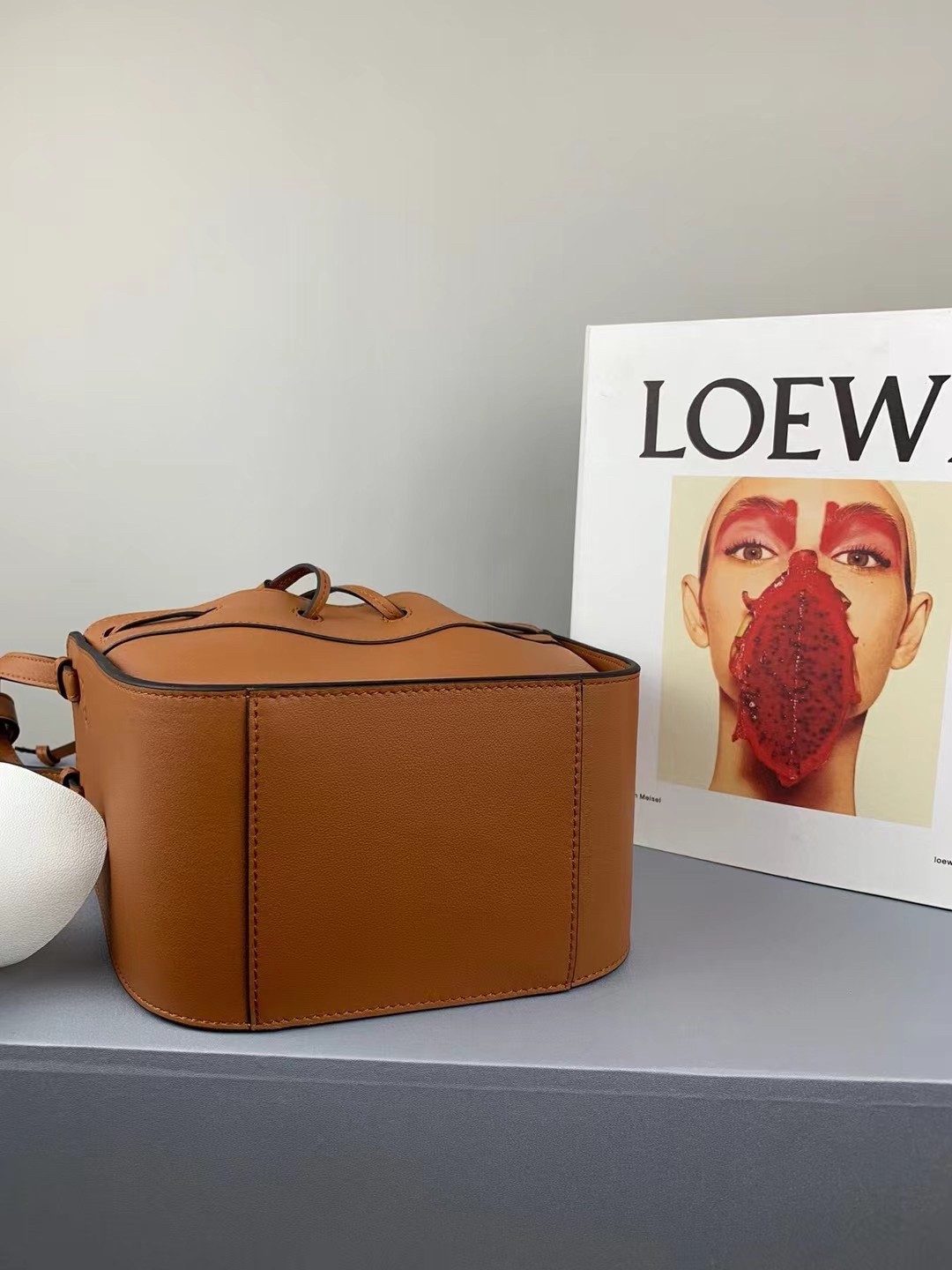 L0ew* mini hammock drawstring bag in brown calfskin
