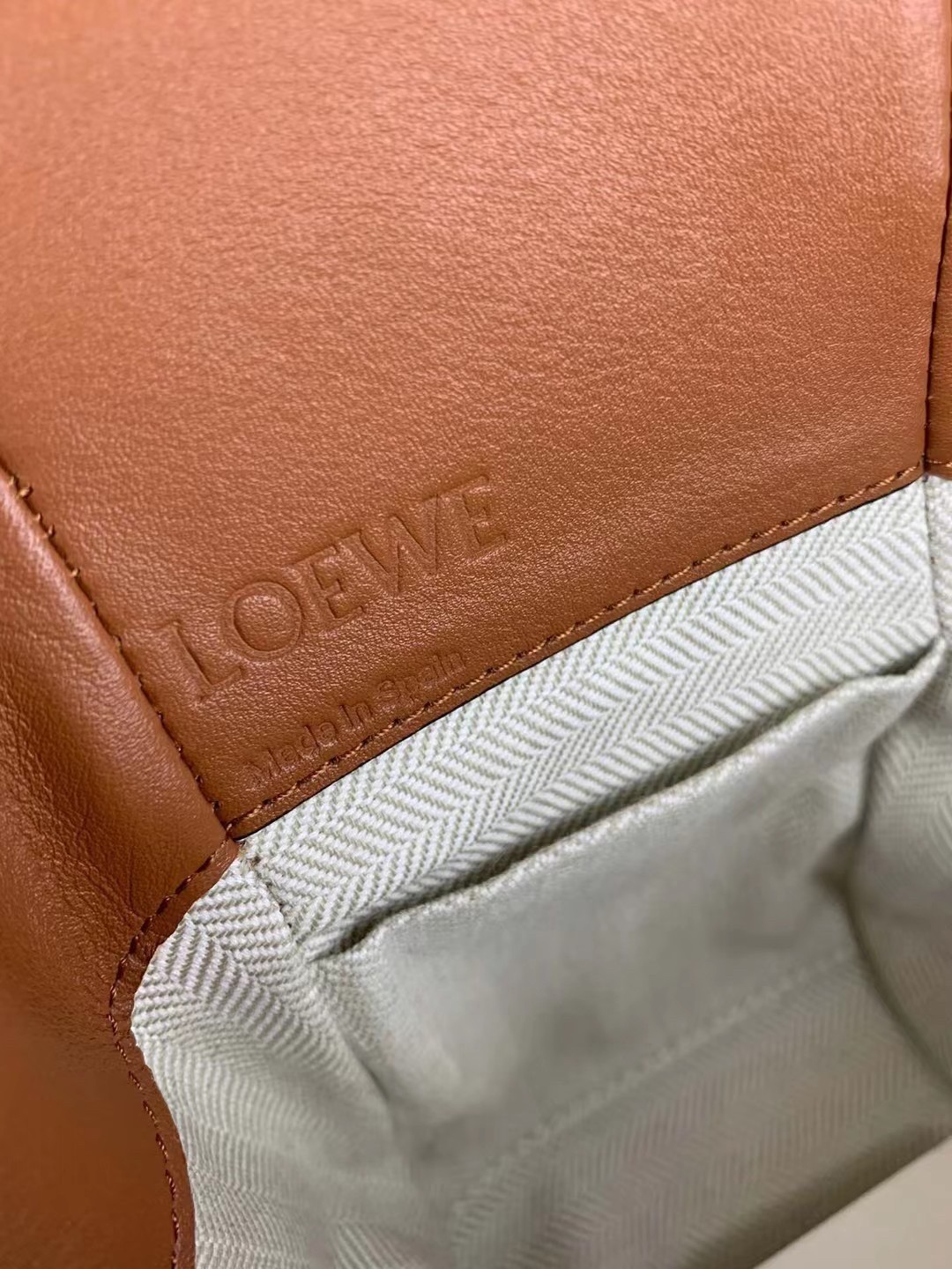 L0ew* mini hammock drawstring bag in brown calfskin