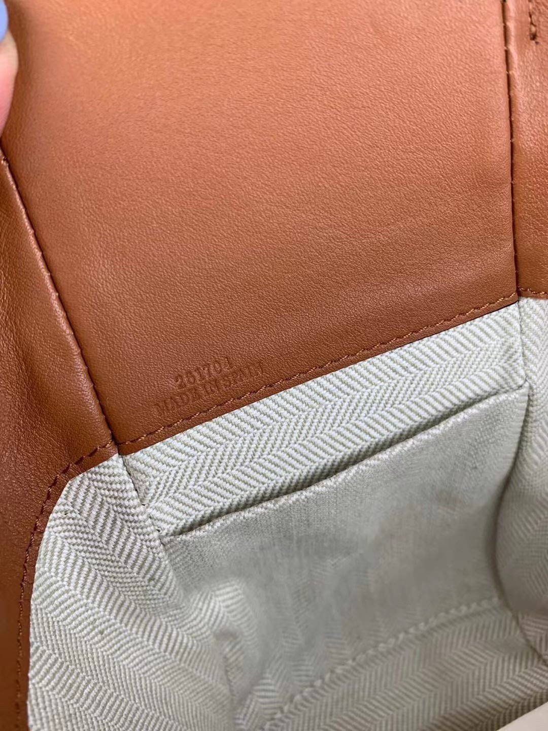 L0ew* mini hammock drawstring bag in brown calfskin