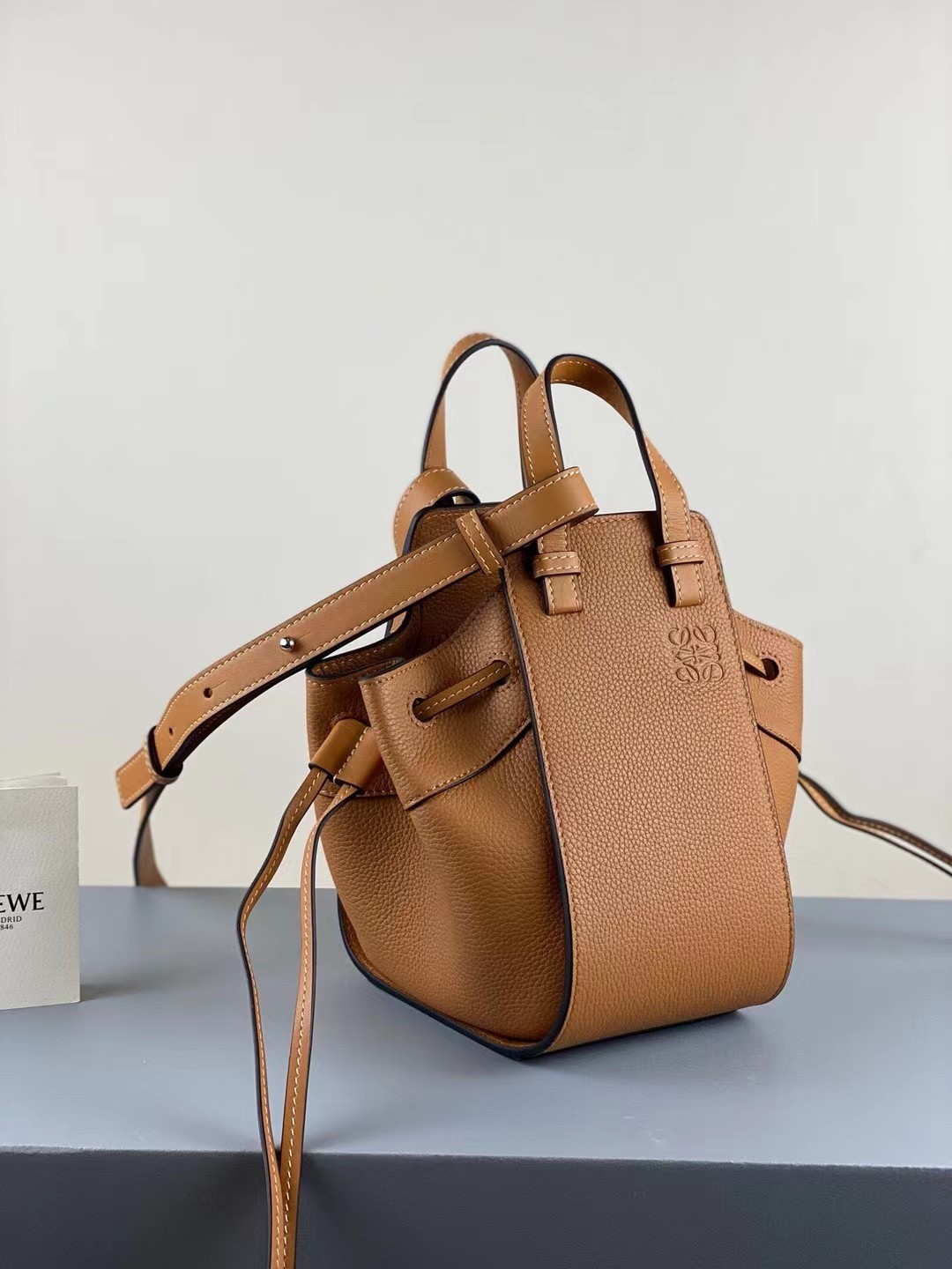 L0ew* mini hammock drawstring bag in brown leather