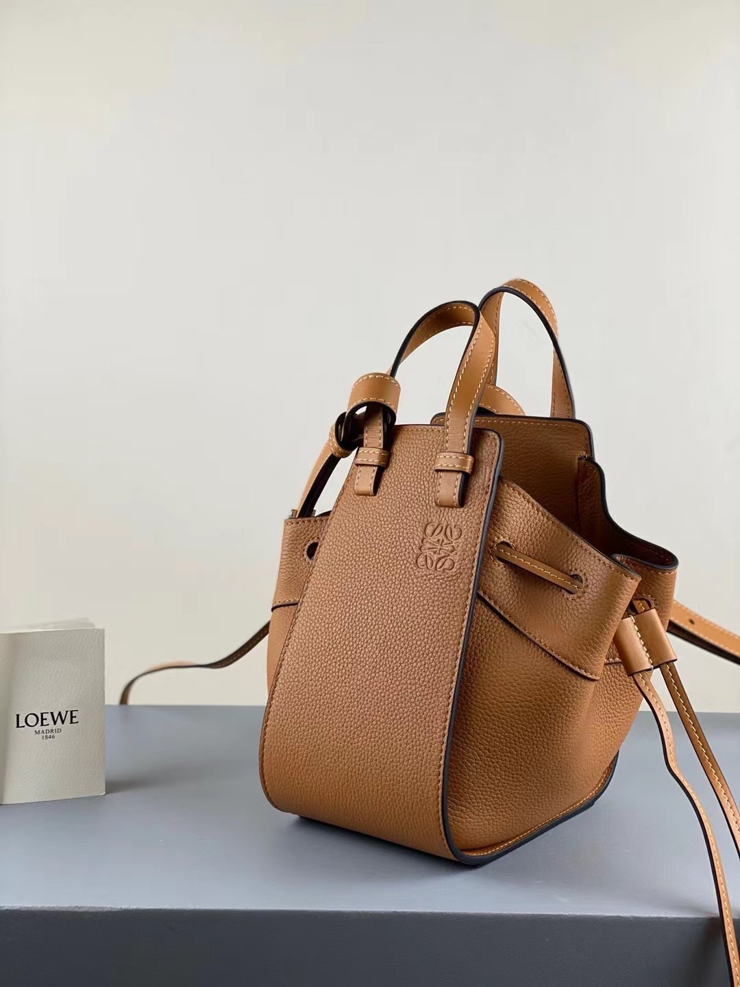 L0ew* mini hammock drawstring bag in brown leather