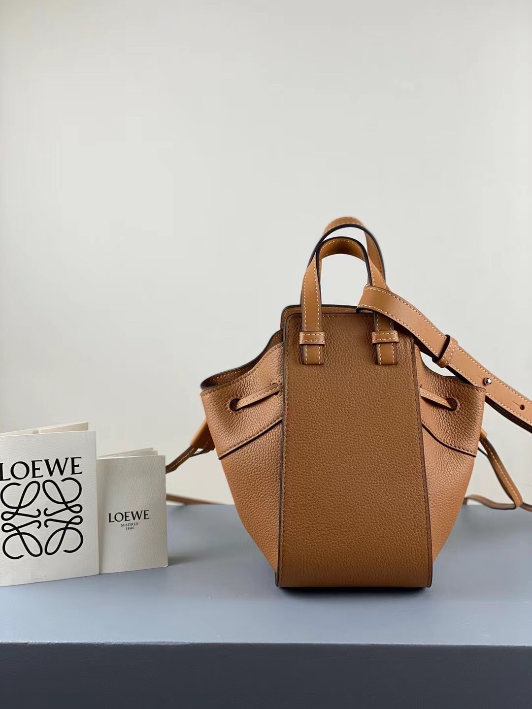 L0ew* mini hammock drawstring bag in brown leather