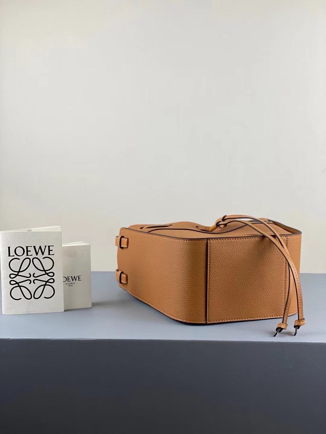 L0ew* mini hammock drawstring bag in brown leather