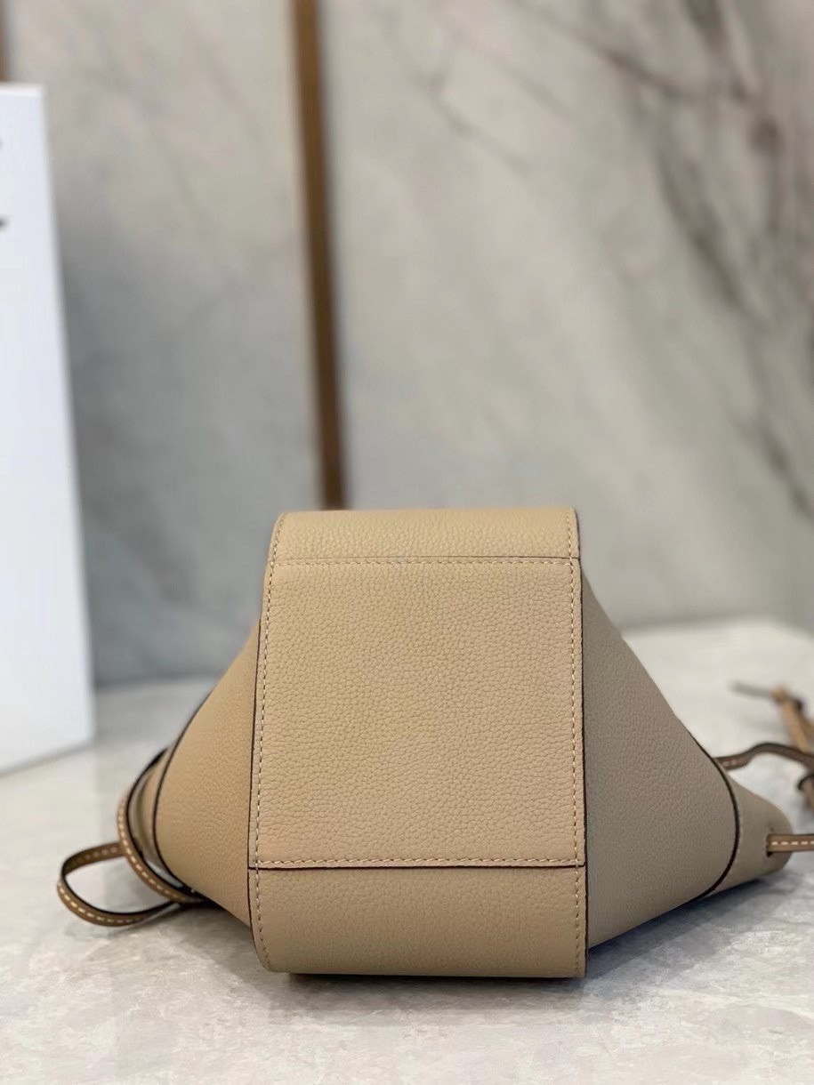 L0ew* mini hammock drawstring bag in sand leather