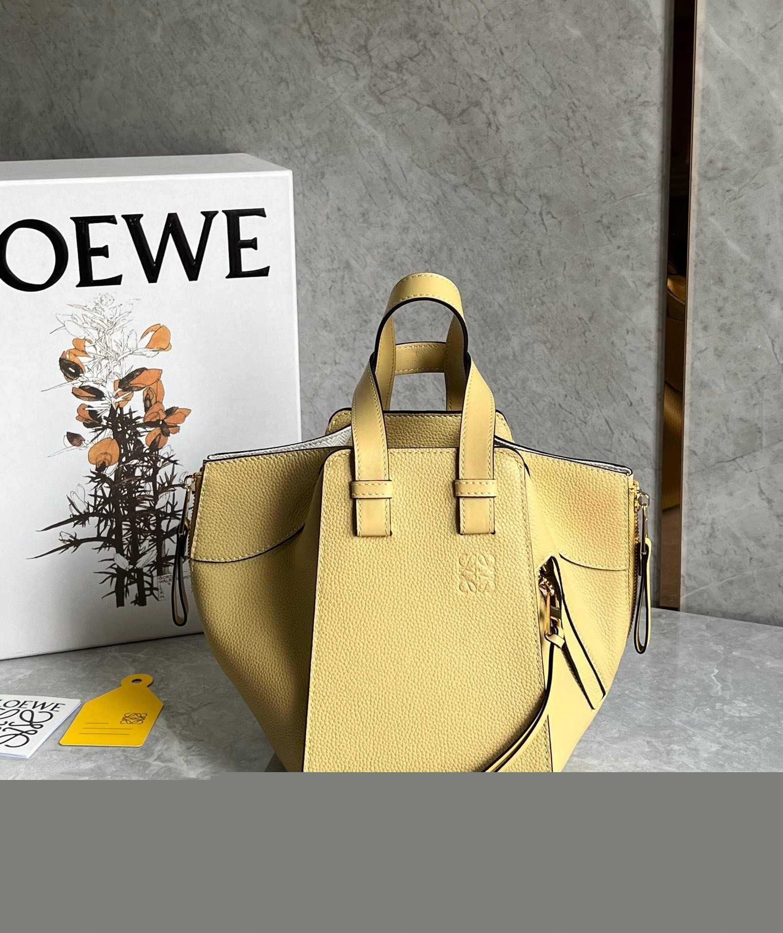 L0ew* compact hammock bag in dark butter grained calfskin