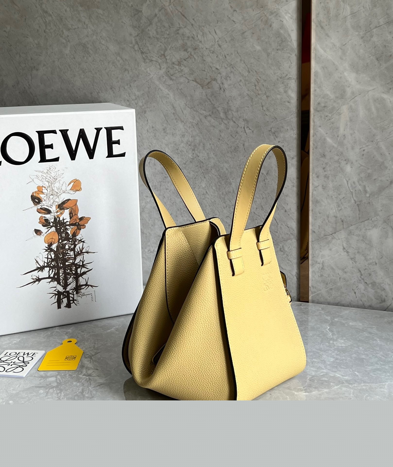 L0ew* compact hammock bag in dark butter grained calfskin