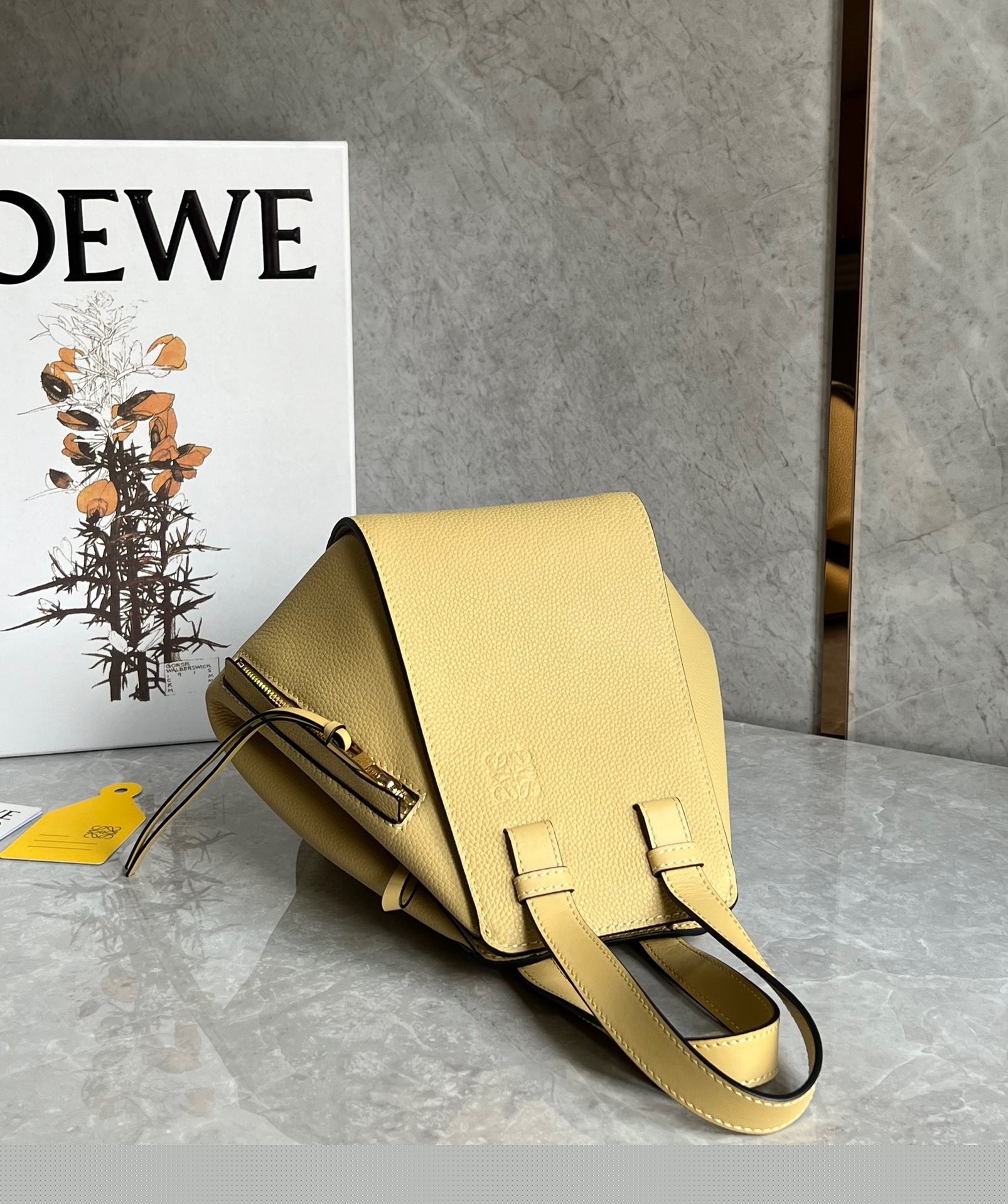 L0ew* compact hammock bag in dark butter grained calfskin
