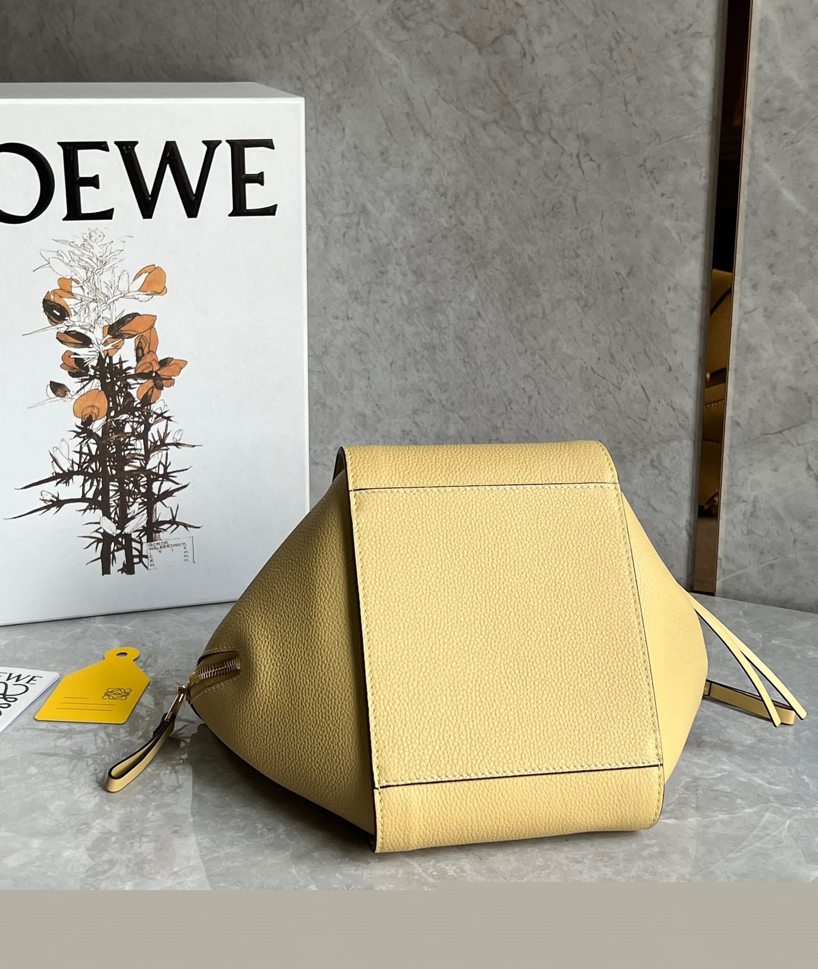 L0ew* compact hammock bag in dark butter grained calfskin