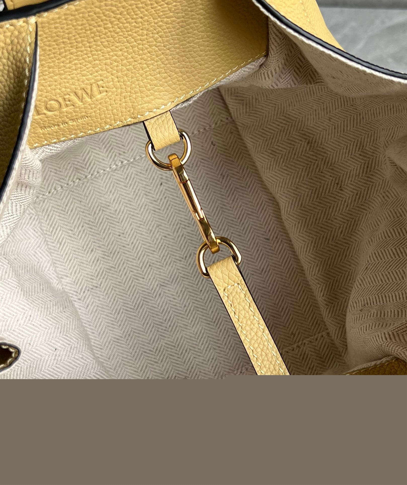 L0ew* compact hammock bag in dark butter grained calfskin