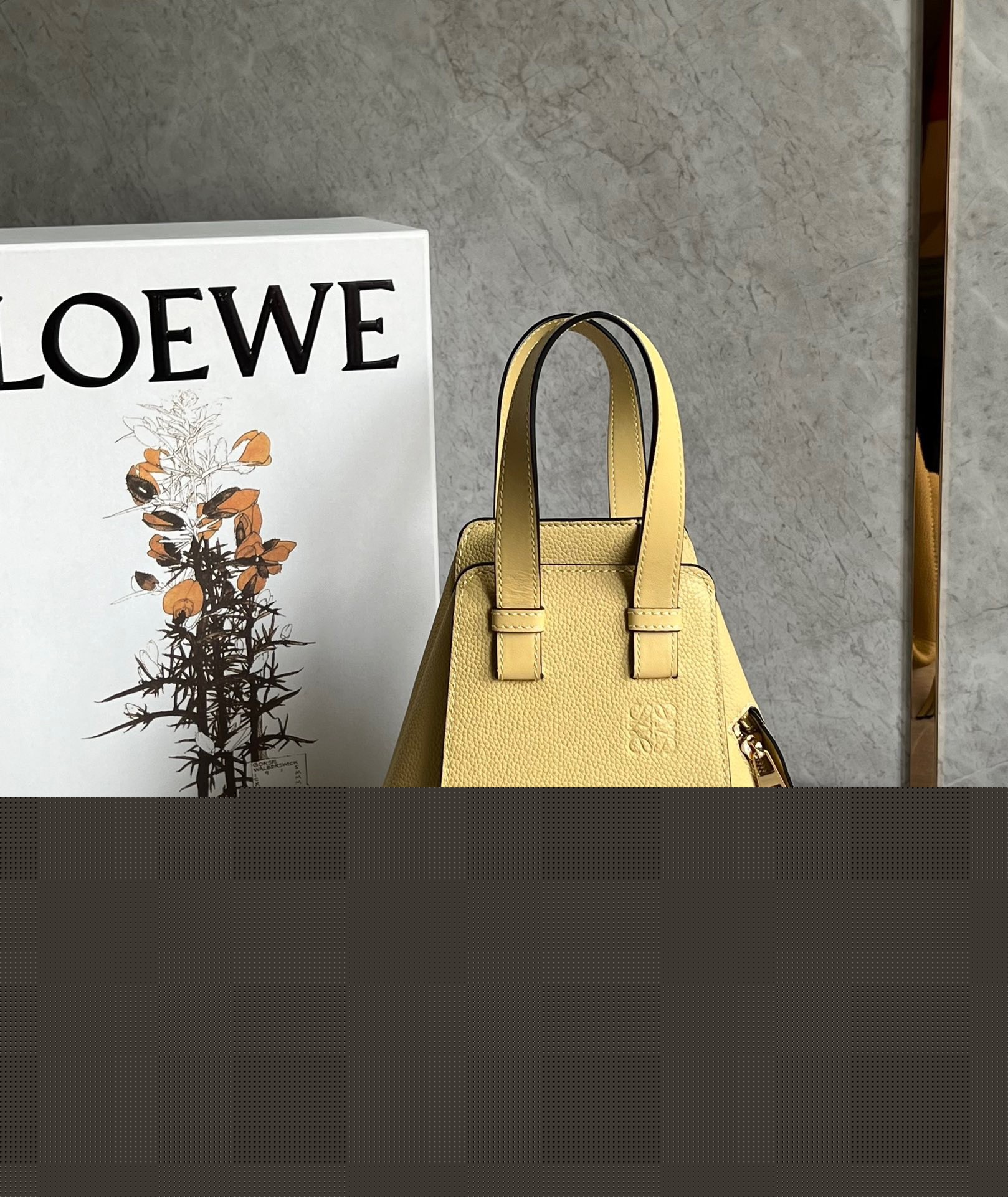 L0ew* compact hammock bag in dark butter grained calfskin