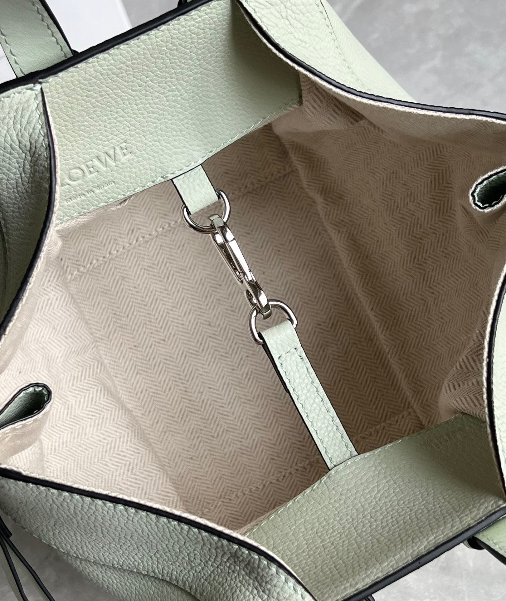L0ew* compact hammock bag in light celadon grained calfskin