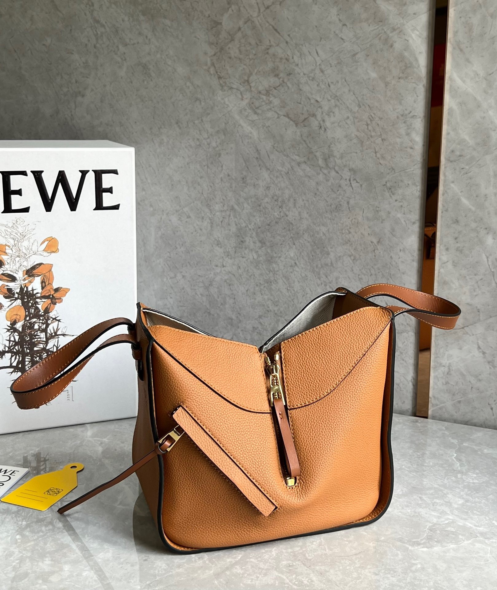 L0ew* compact hammock bag in light caramel grained calfskin