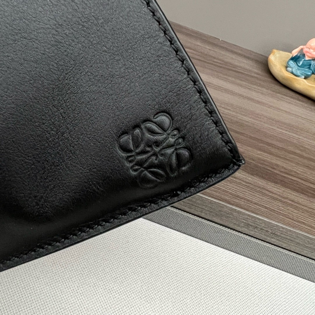L0ew* anton sling bag in black calfskin and jacquard