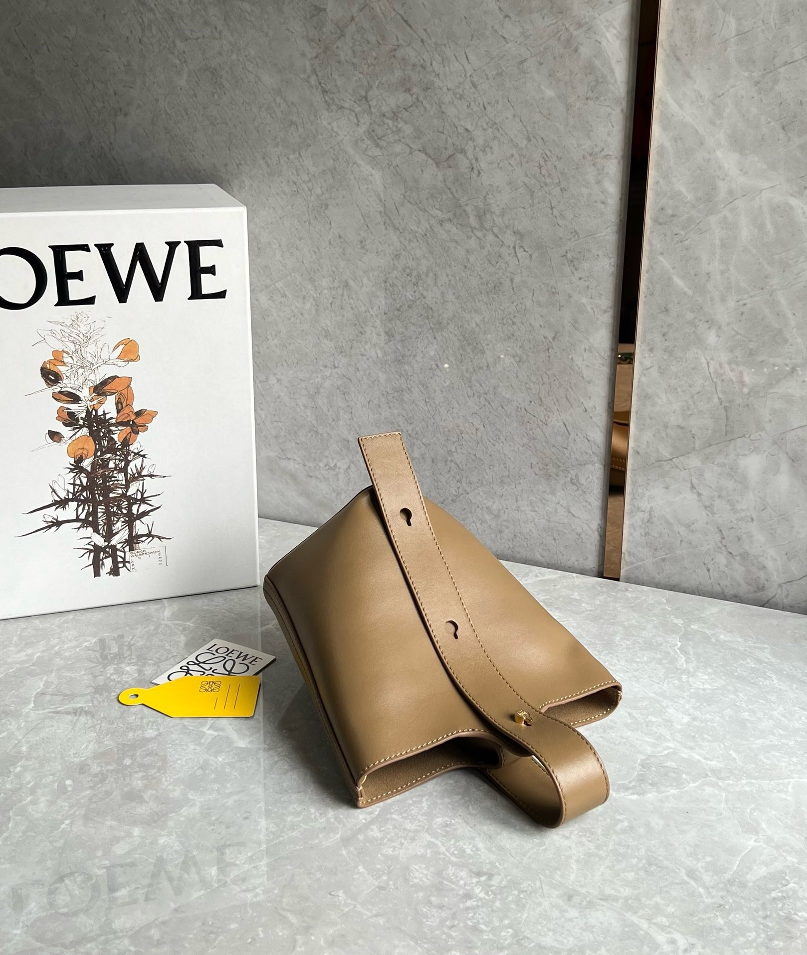 L0ew* mini pebble bucket bag in oak calfskin