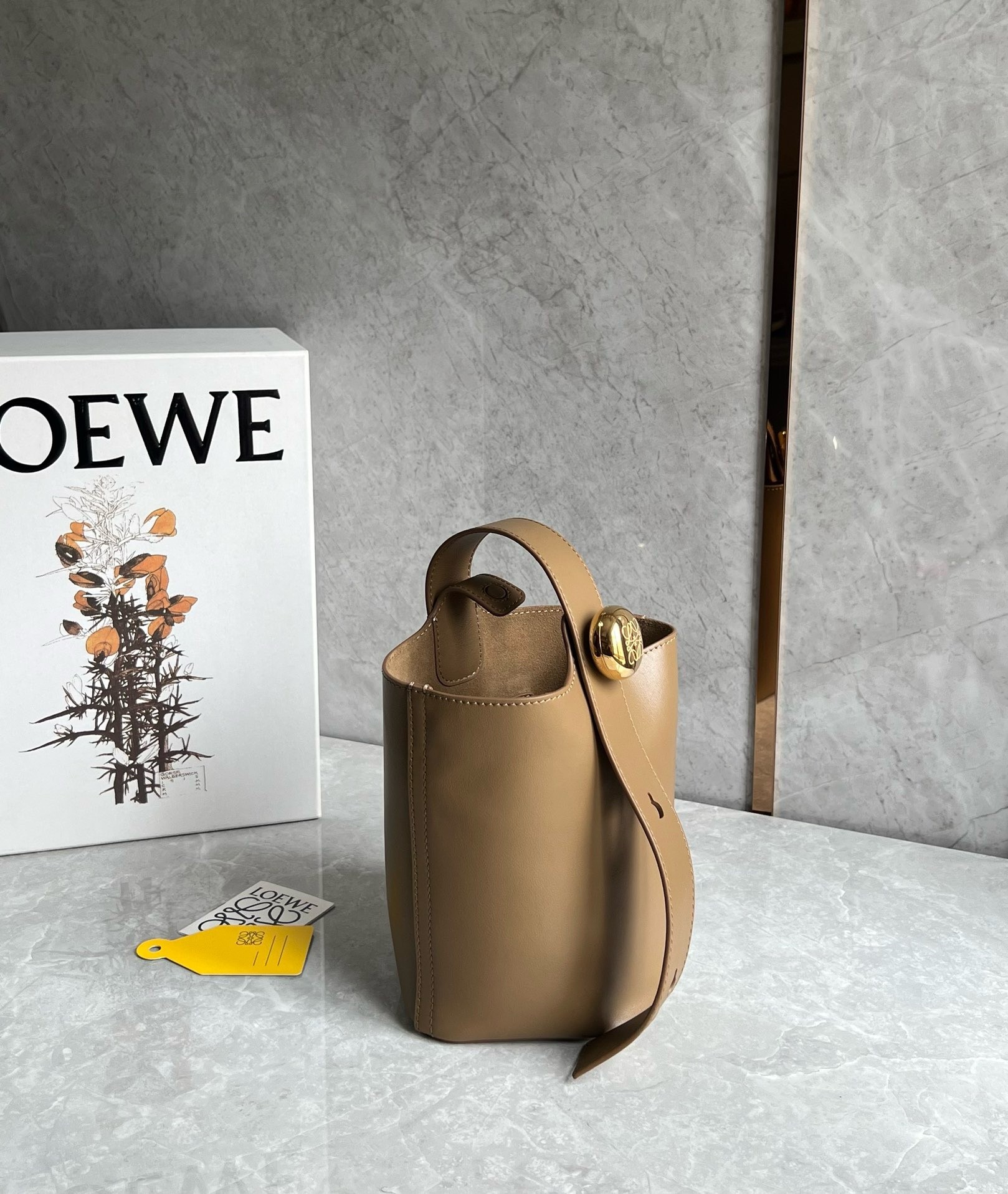 L0ew* mini pebble bucket bag in oak calfskin