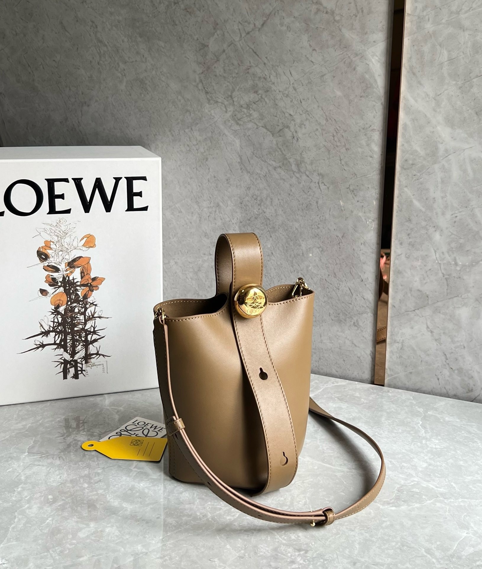 L0ew* mini pebble bucket bag in oak calfskin