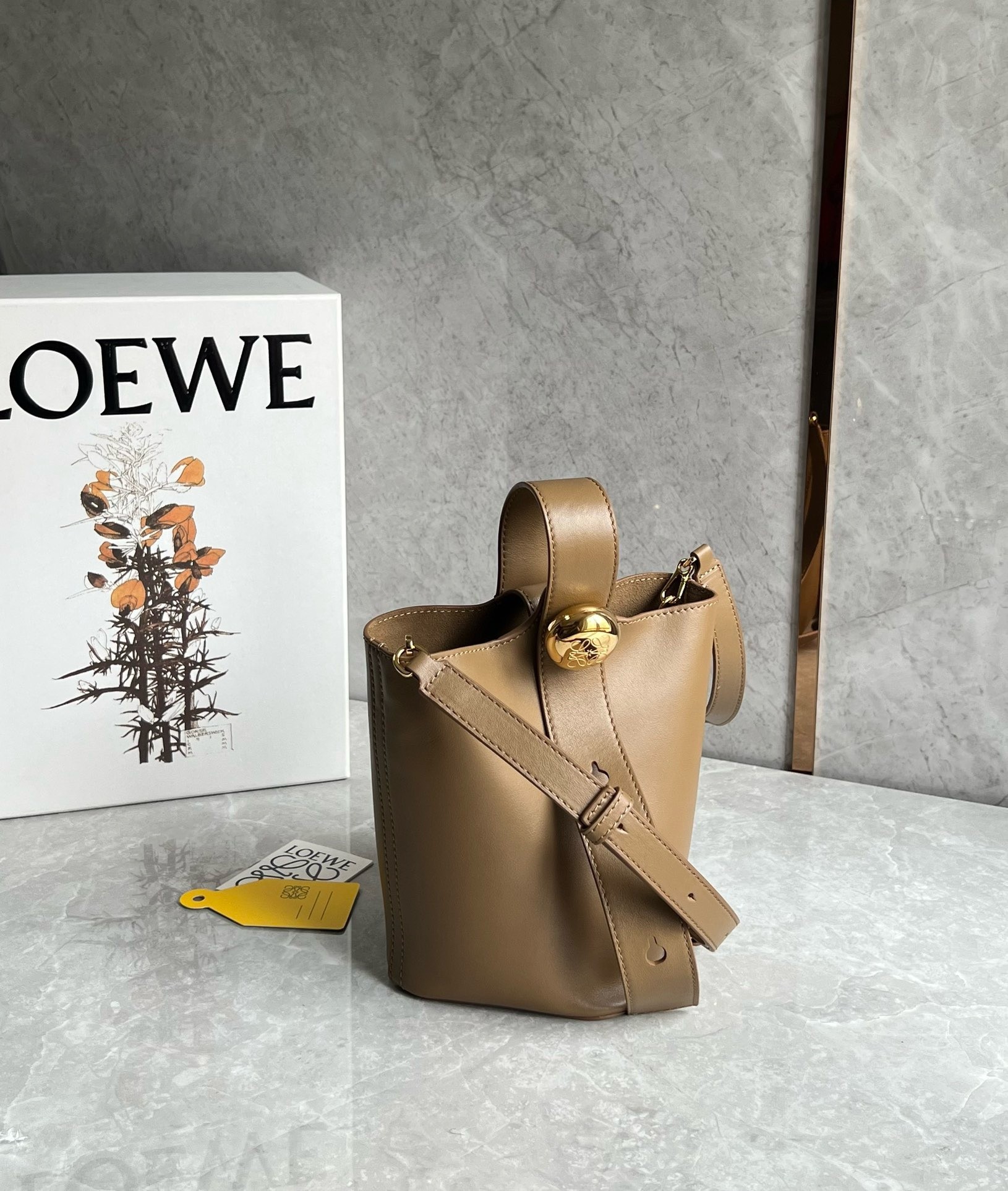 L0ew* mini pebble bucket bag in oak calfskin