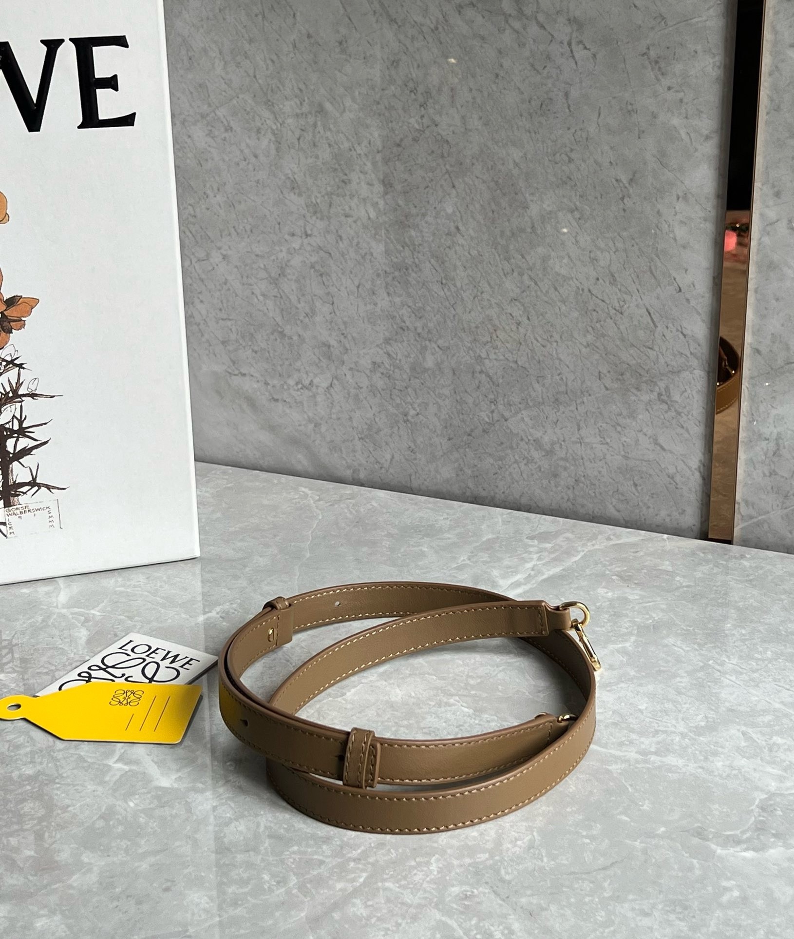 L0ew* mini pebble bucket bag in oak calfskin