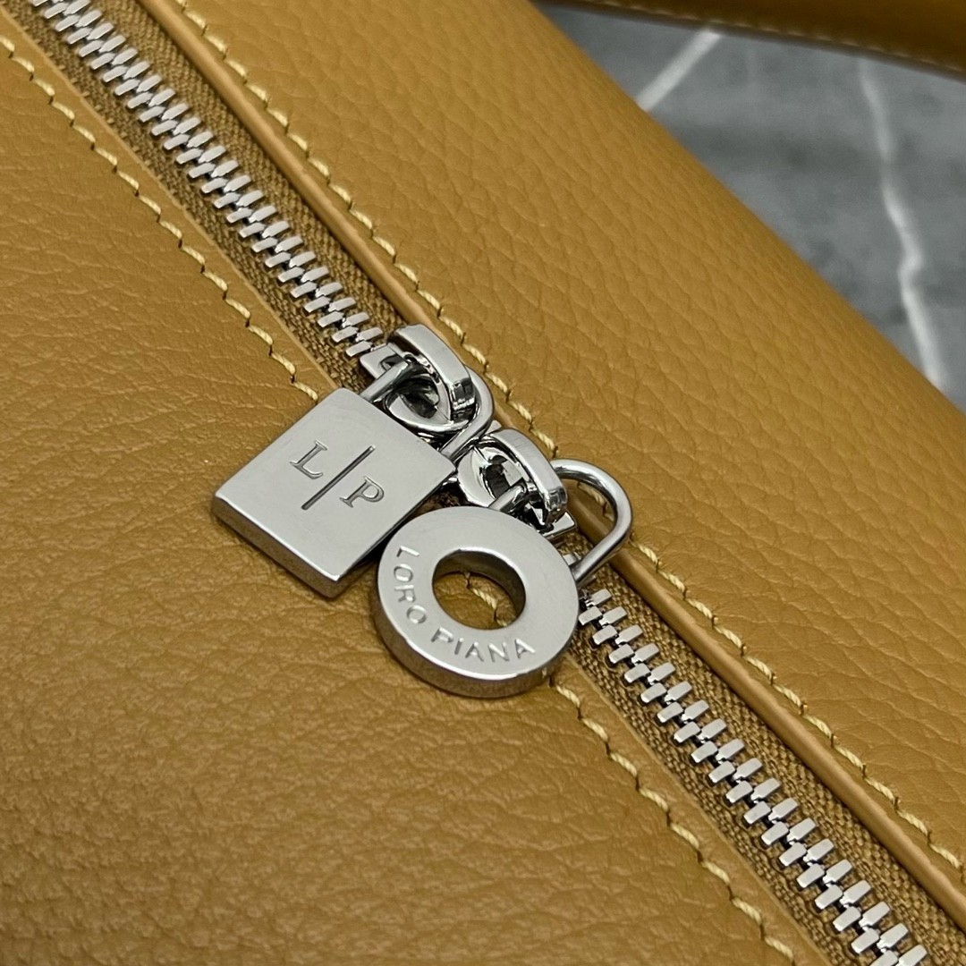 L**o p*ana extra pocket pouch l27 in chai grained leather