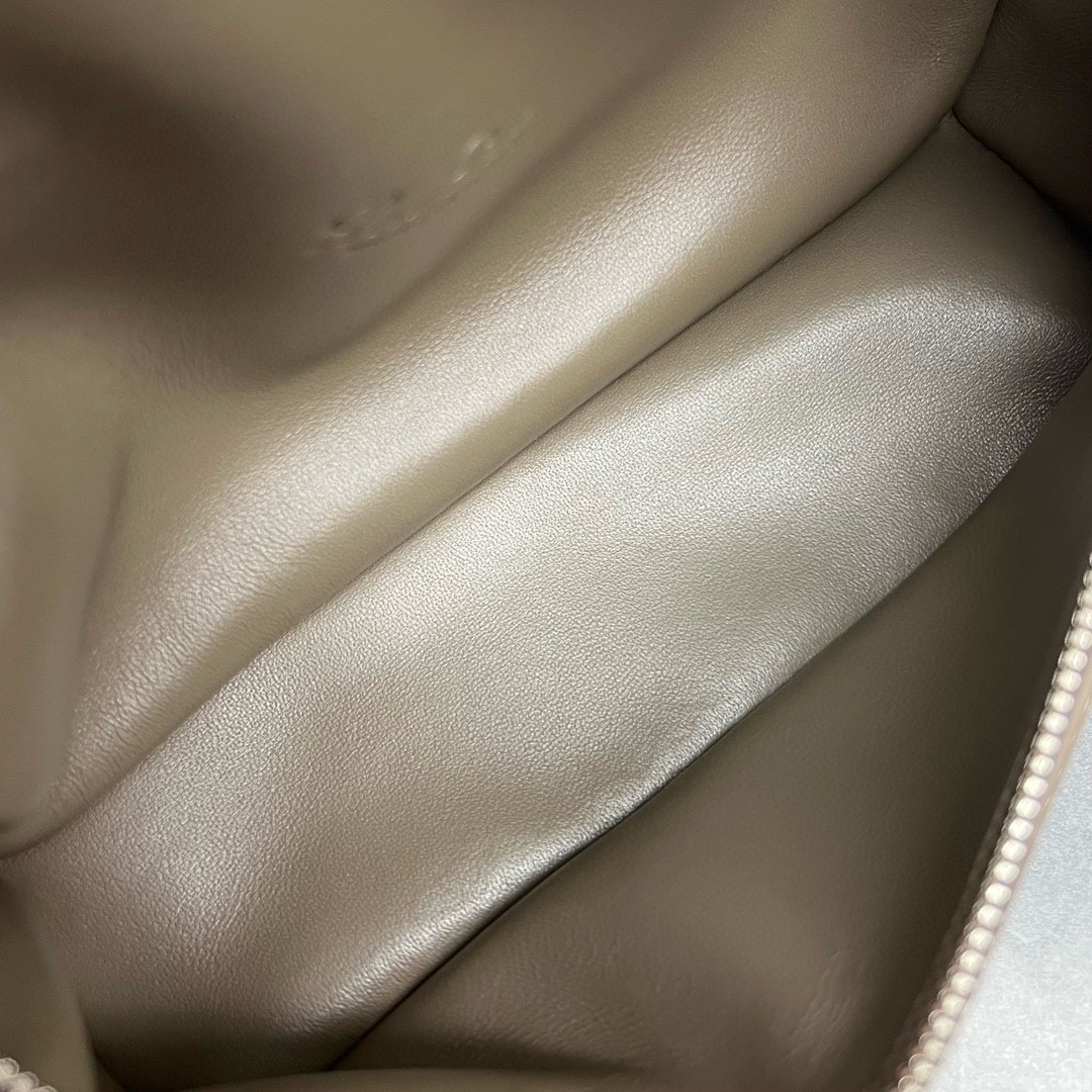 L**o p*ana extra pocket pouch l27 in taupe grained leather