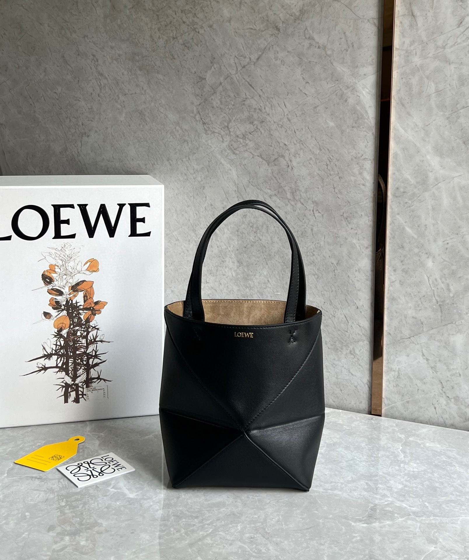 L0ew* mini puzzle fold tote bag in black calfskin