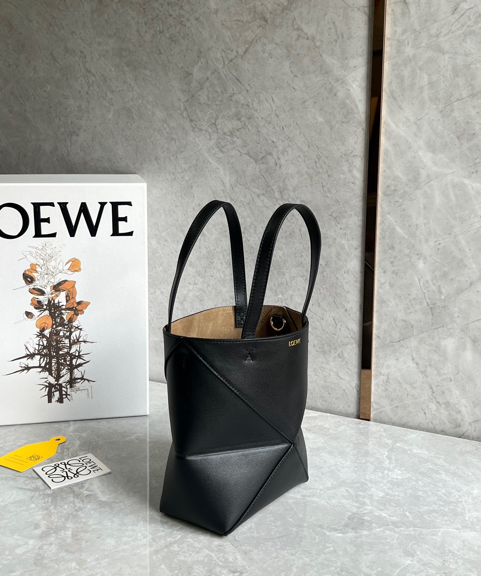 L0ew* mini puzzle fold tote bag in black calfskin