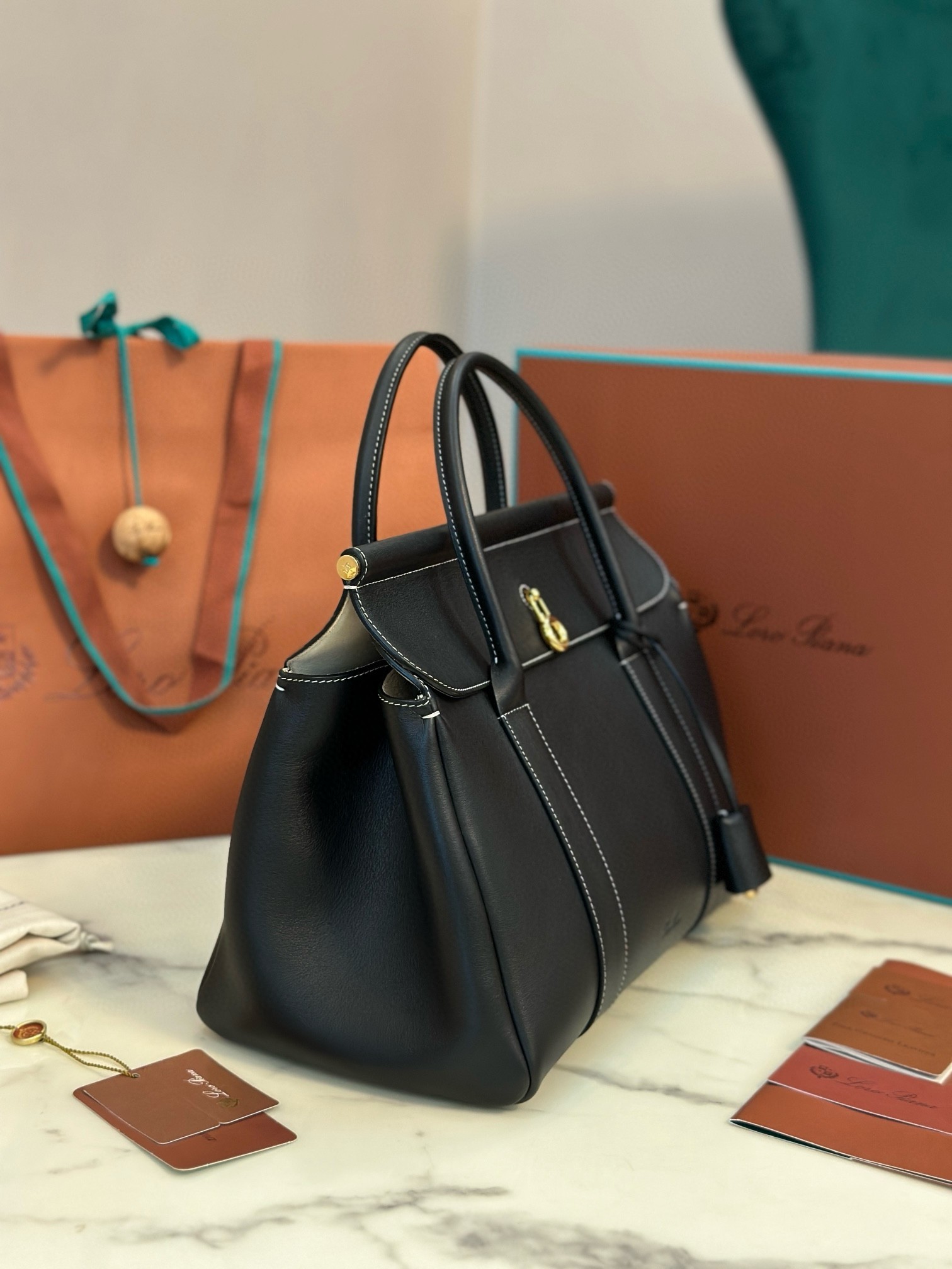 L**o p*ana loom l32 bag in black smooth calfskin