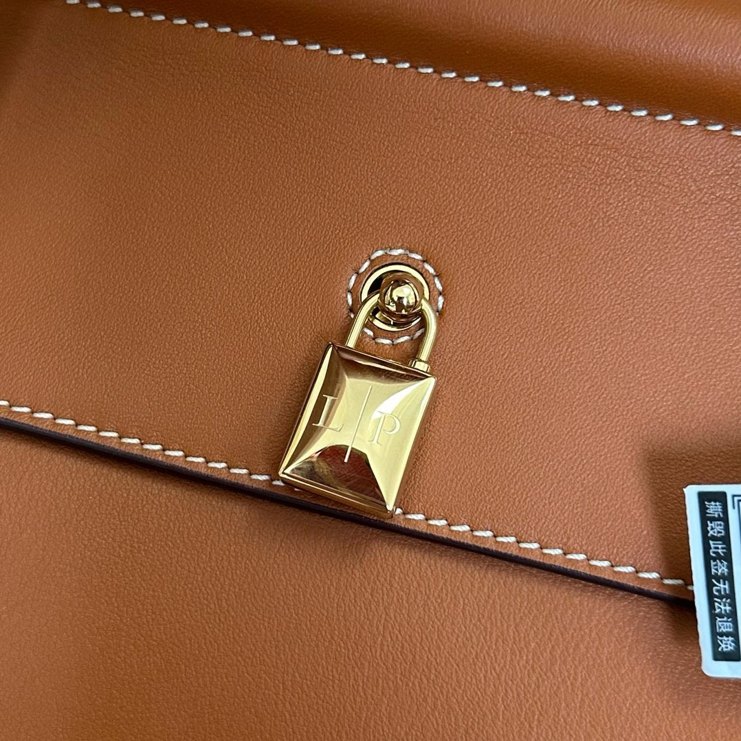 L**o p*ana loom l32 bag in tan smooth calfskin