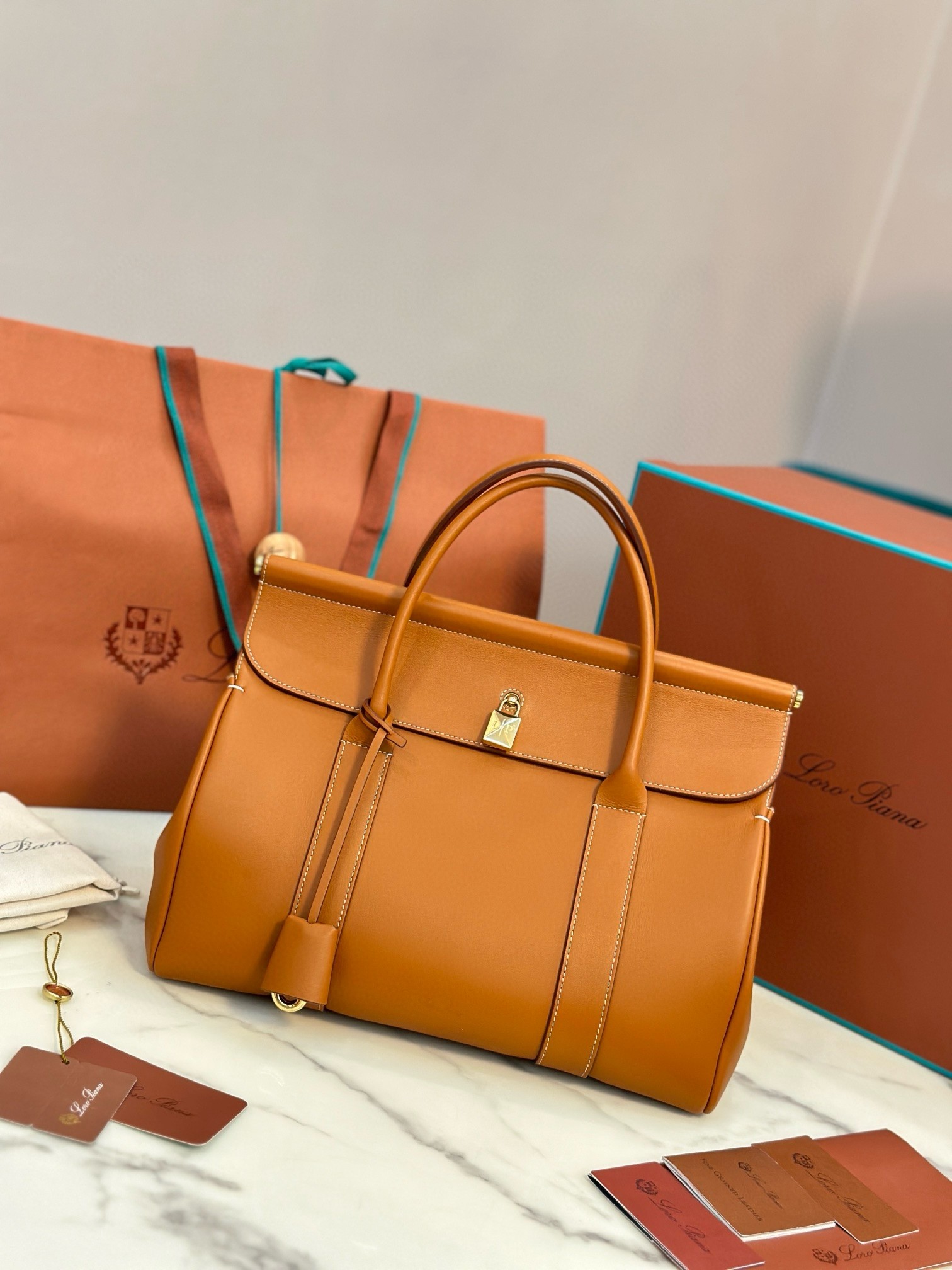 L**o p*ana loom l32 bag in tan smooth calfskin