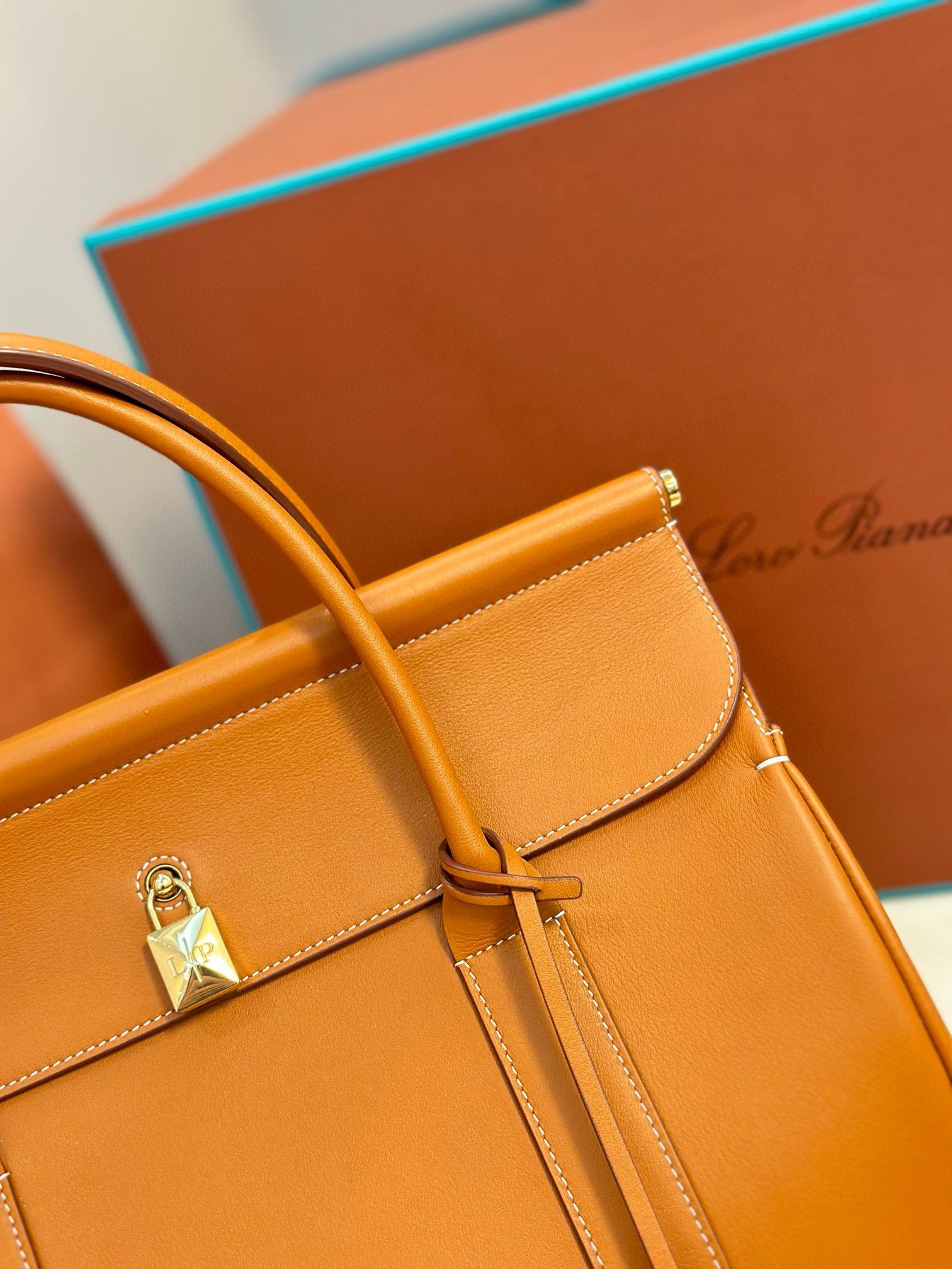 L**o p*ana loom l32 bag in tan smooth calfskin