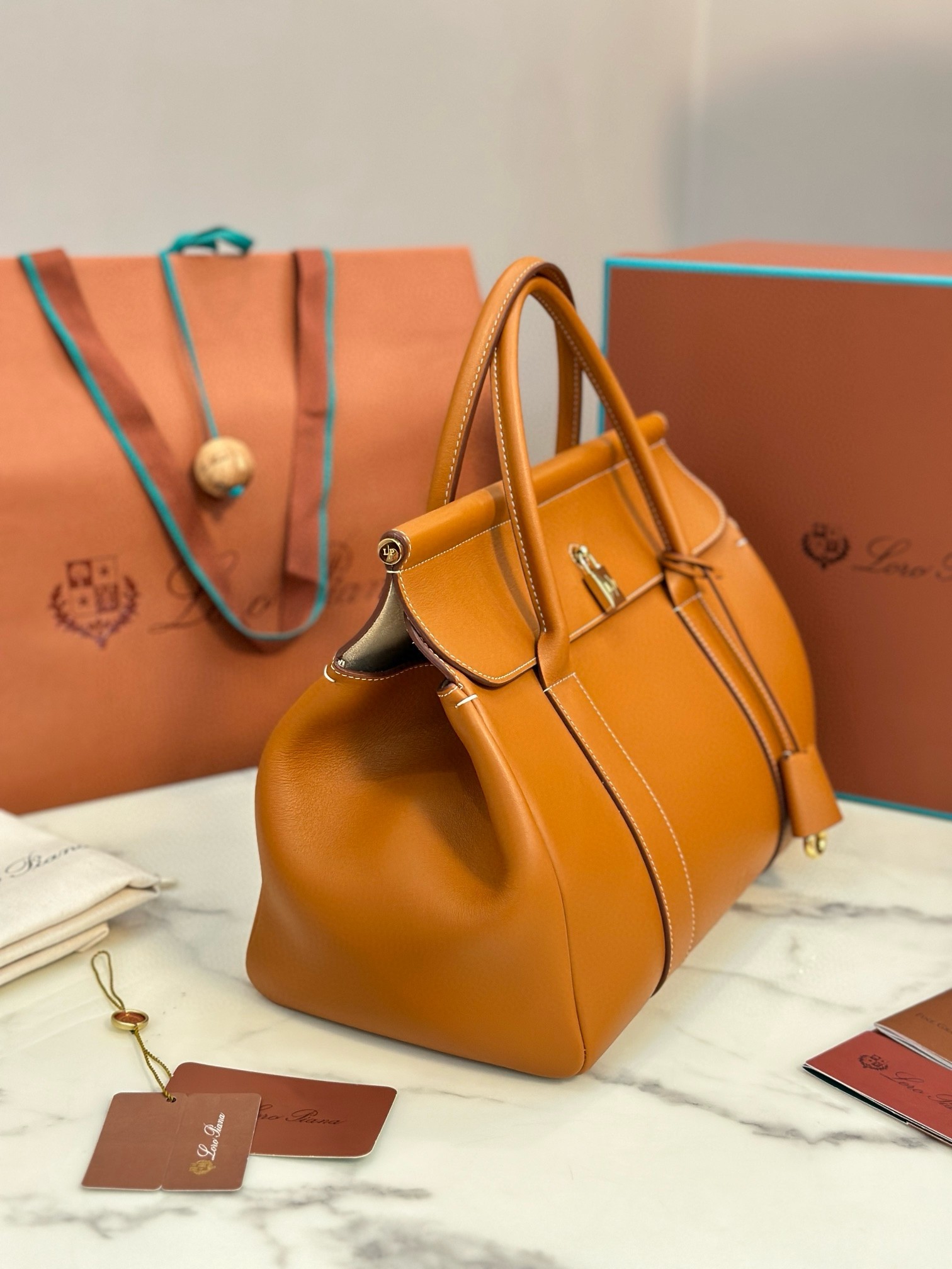 L**o p*ana loom l32 bag in tan smooth calfskin