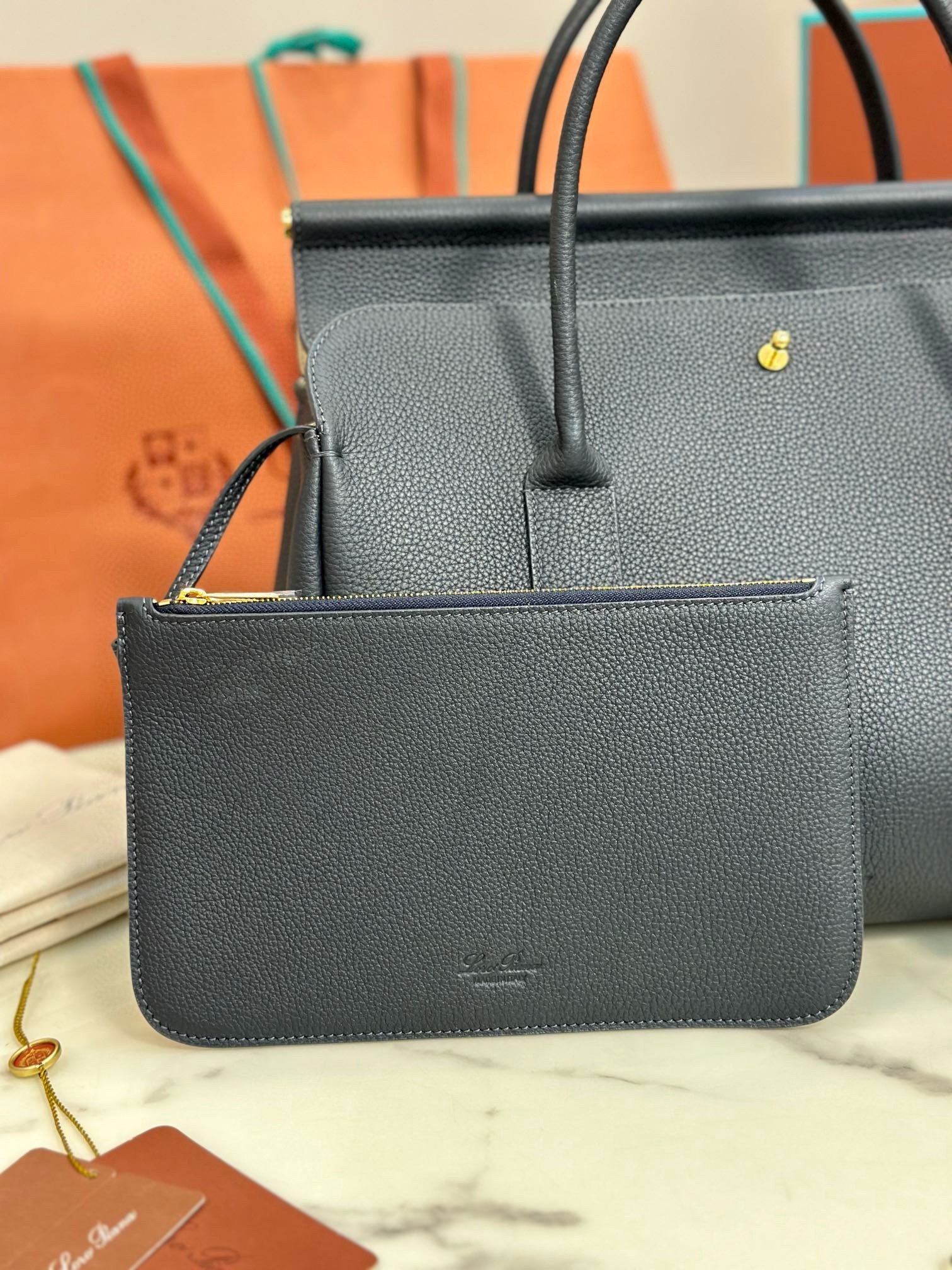 L**o p*ana loom l32 bag in navy blue grained leather