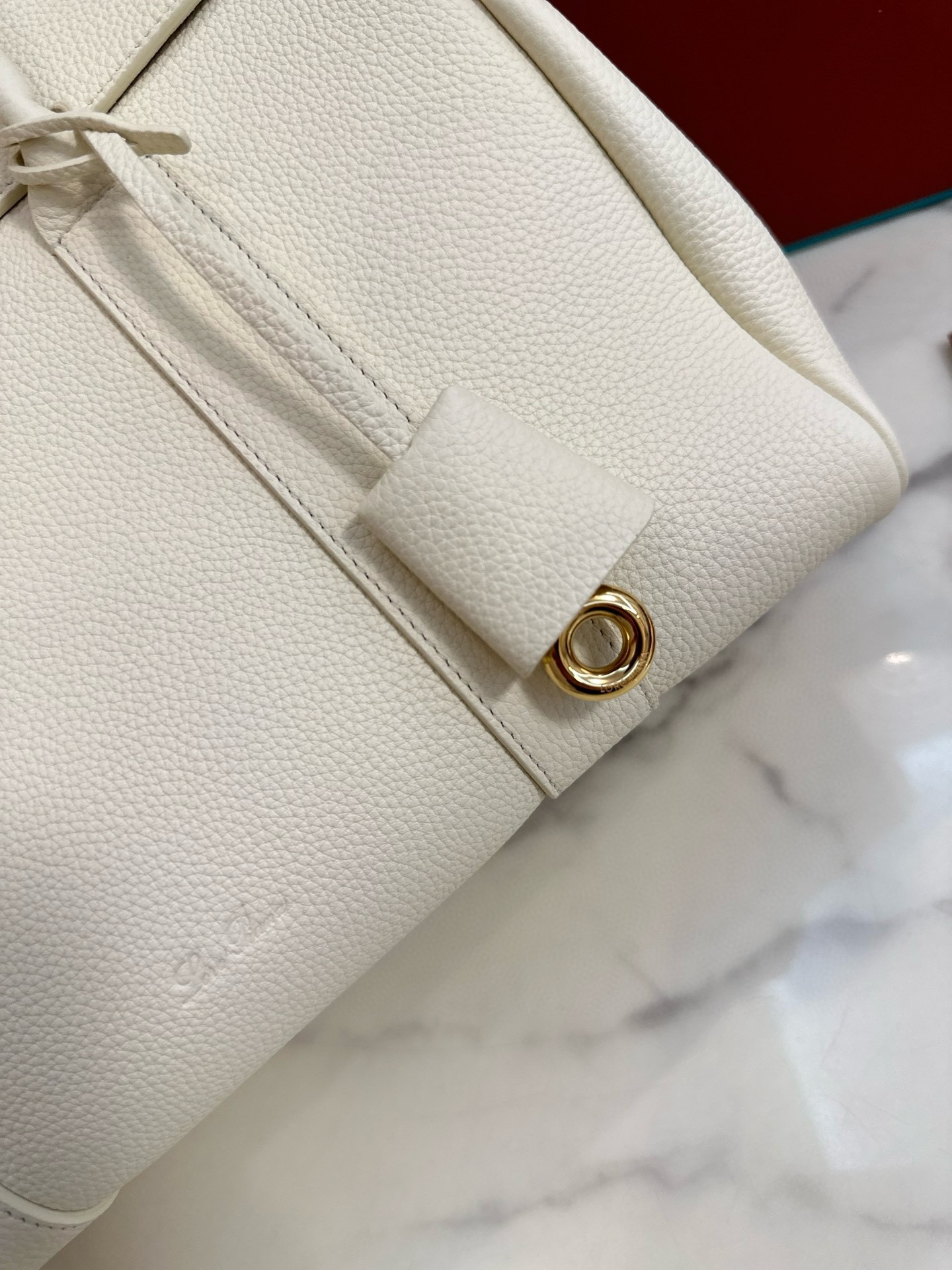 L**o p*ana loom l32 bag in white grained leather