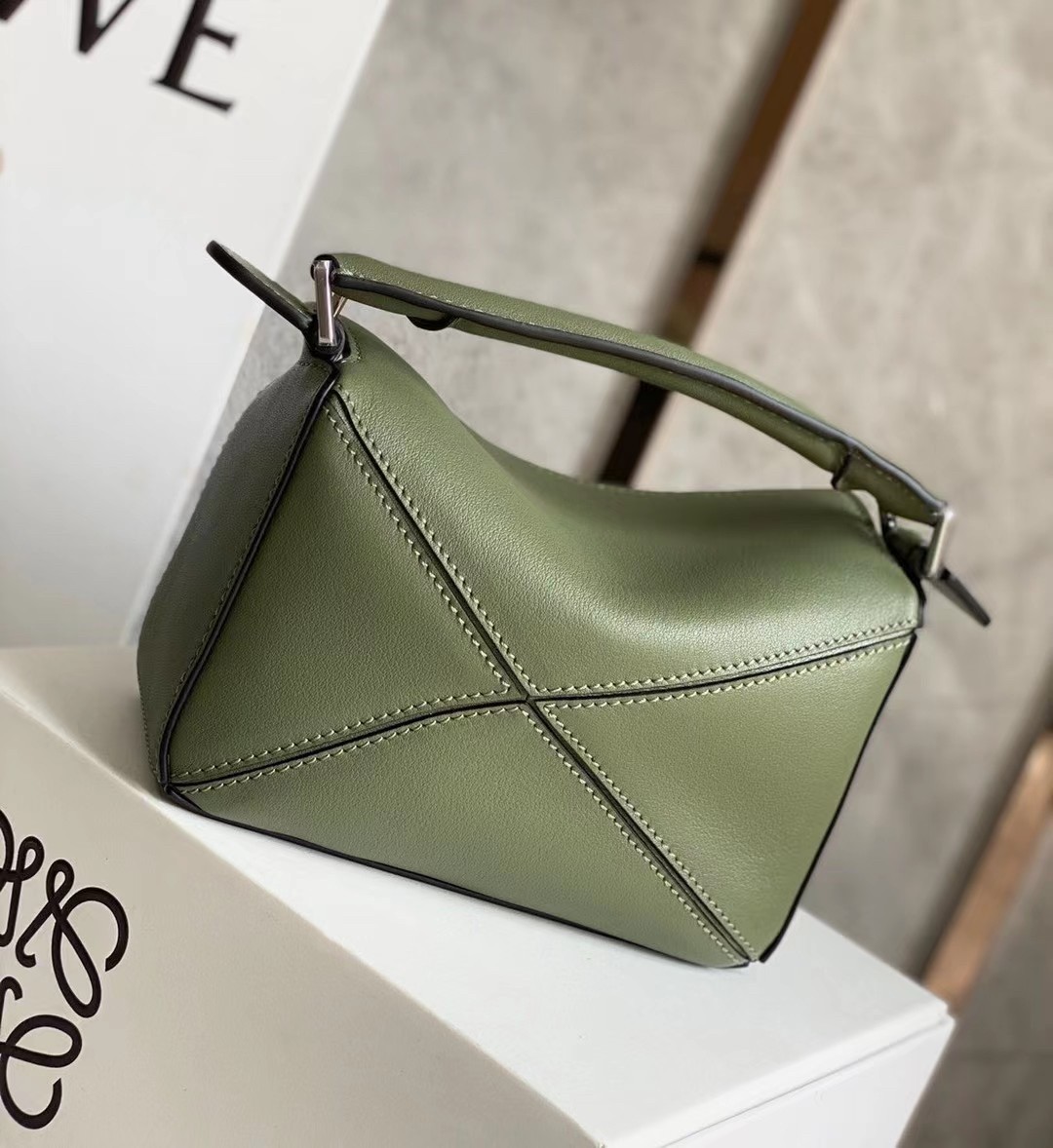 L0ew* puzzle mini bag in avocado green calfskin