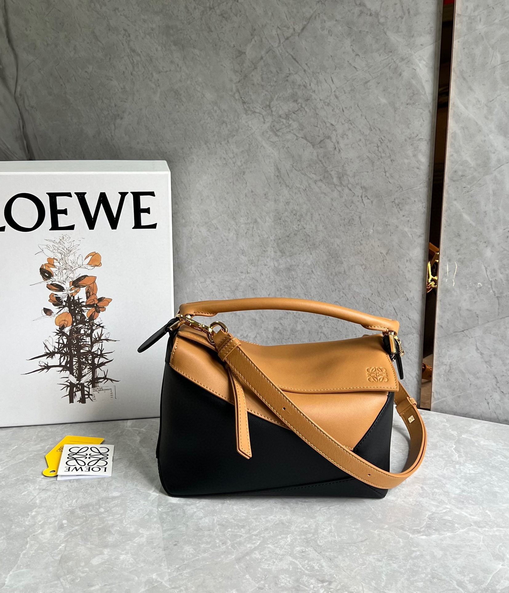 L0ew* puzzle small bag in brown and black calfskin