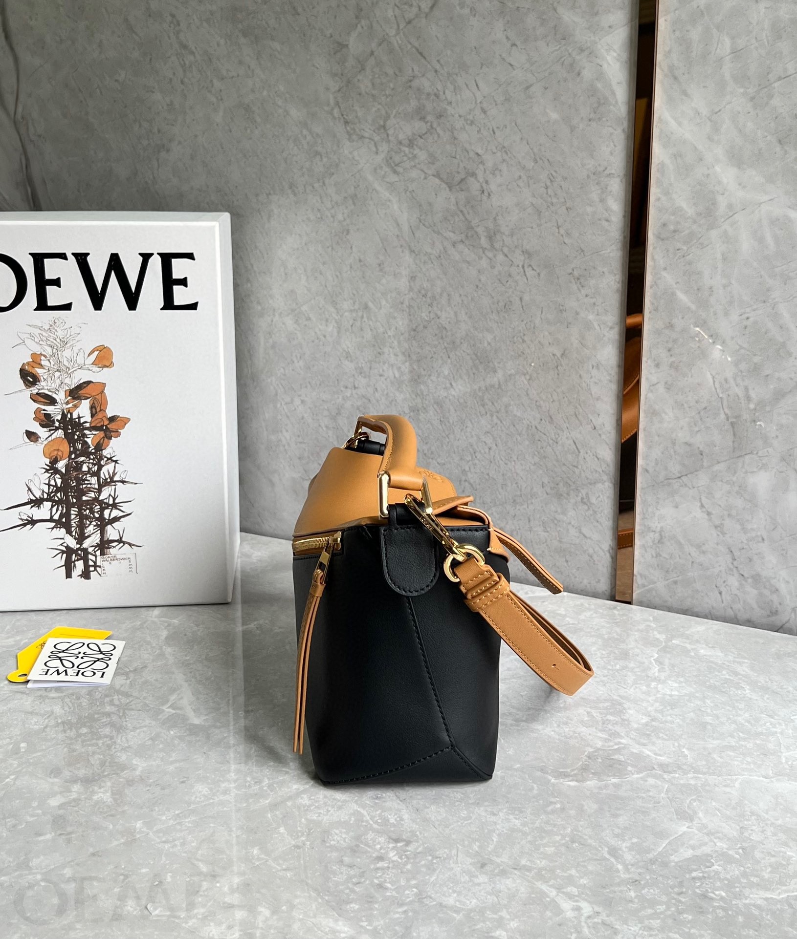 L0ew* puzzle small bag in brown and black calfskin