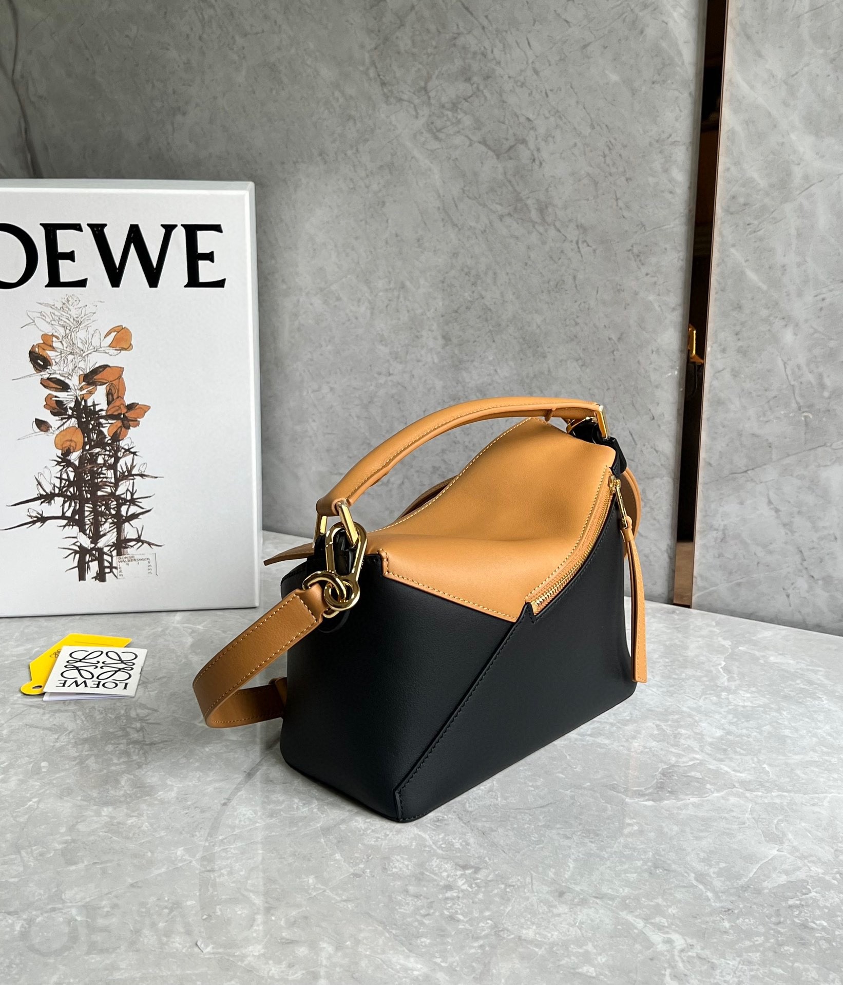 L0ew* puzzle small bag in brown and black calfskin