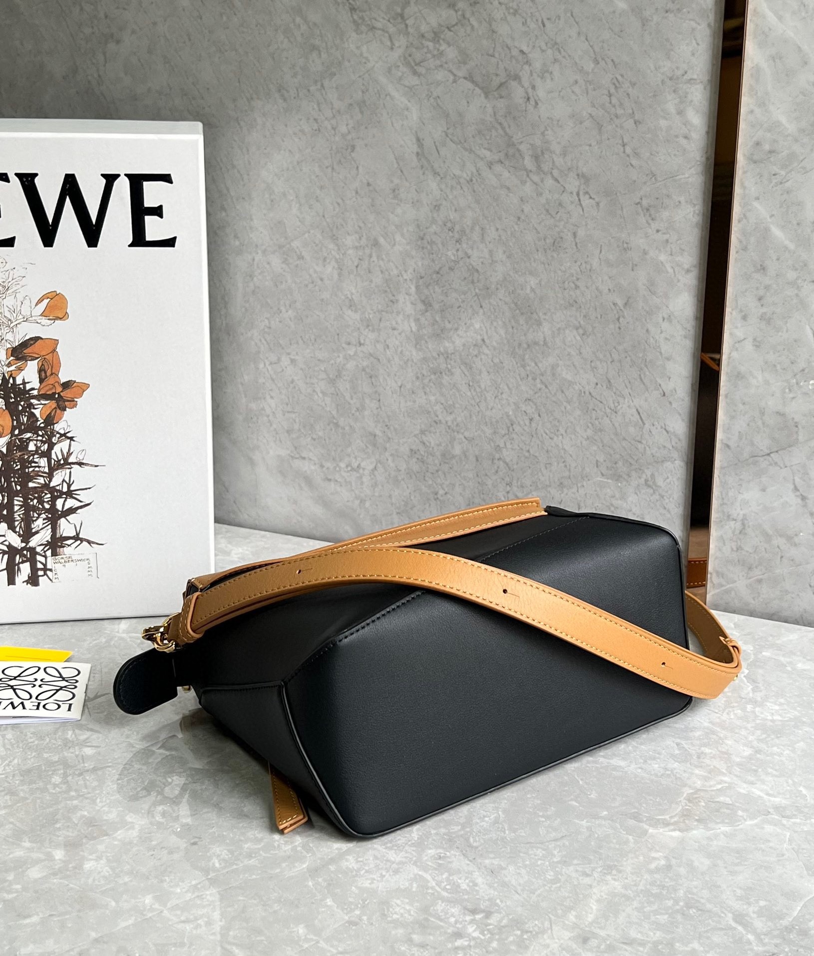 L0ew* puzzle small bag in brown and black calfskin