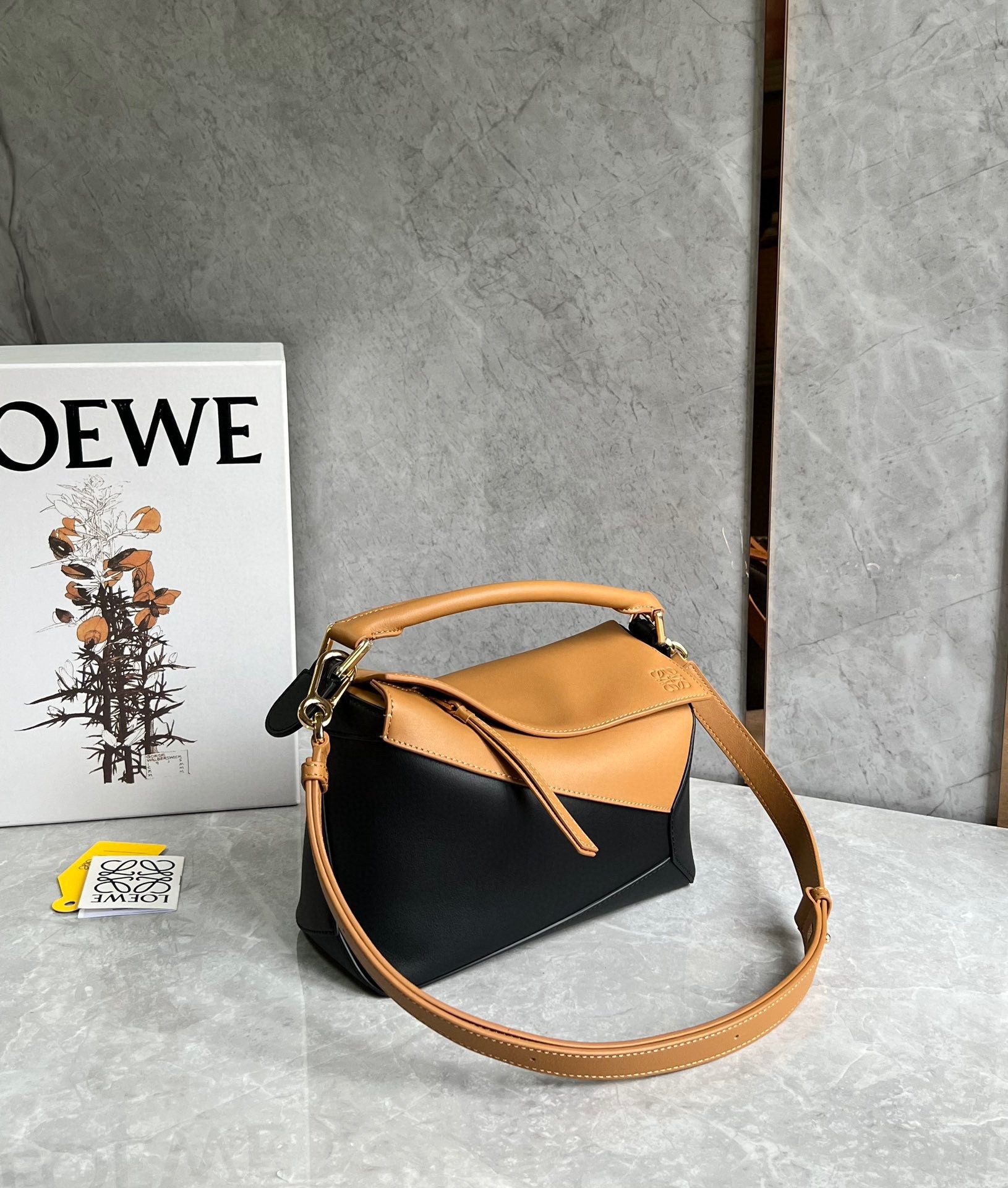 L0ew* puzzle small bag in brown and black calfskin