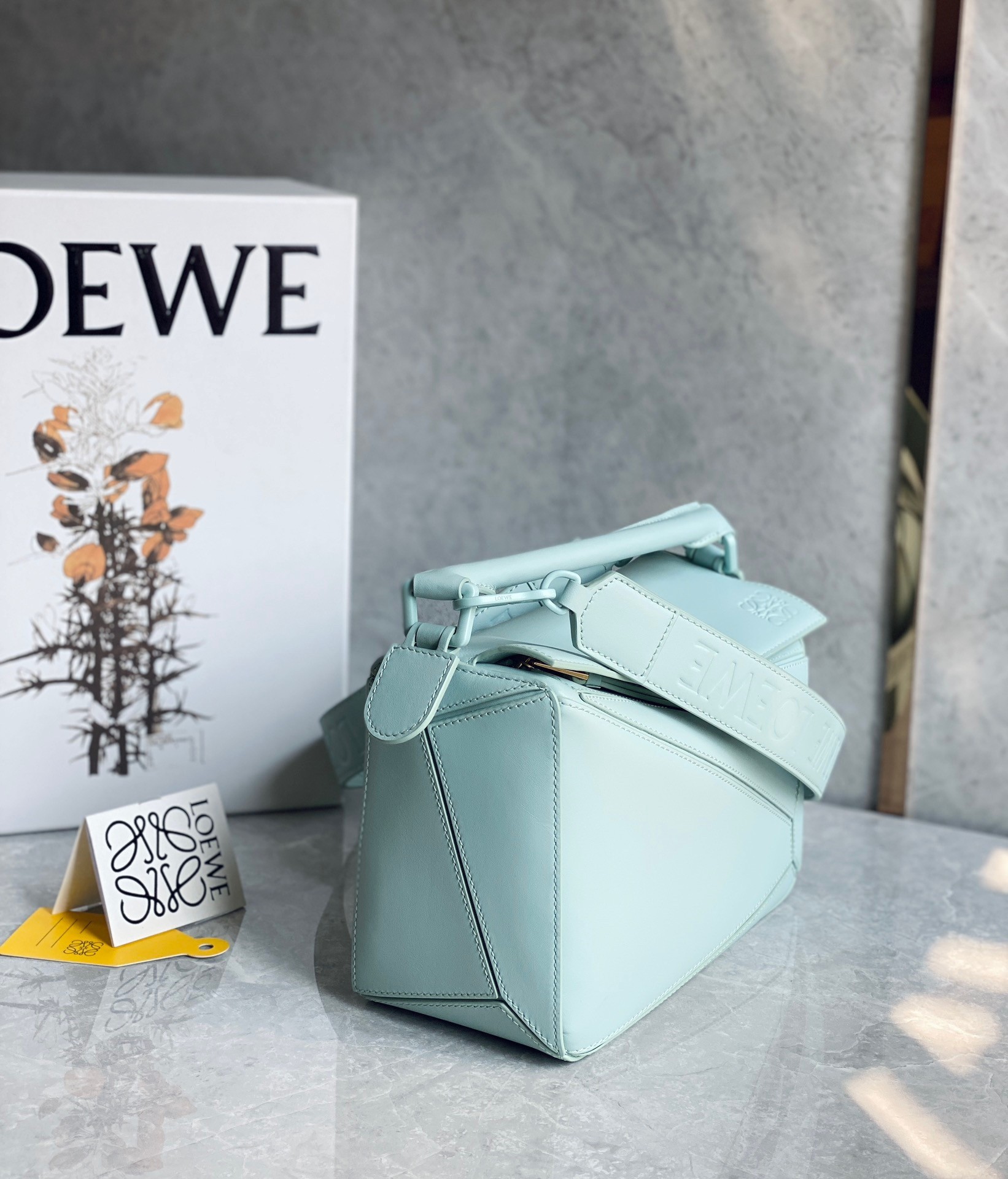 L0ew* puzzle small bag in aquamarine satin calfskin