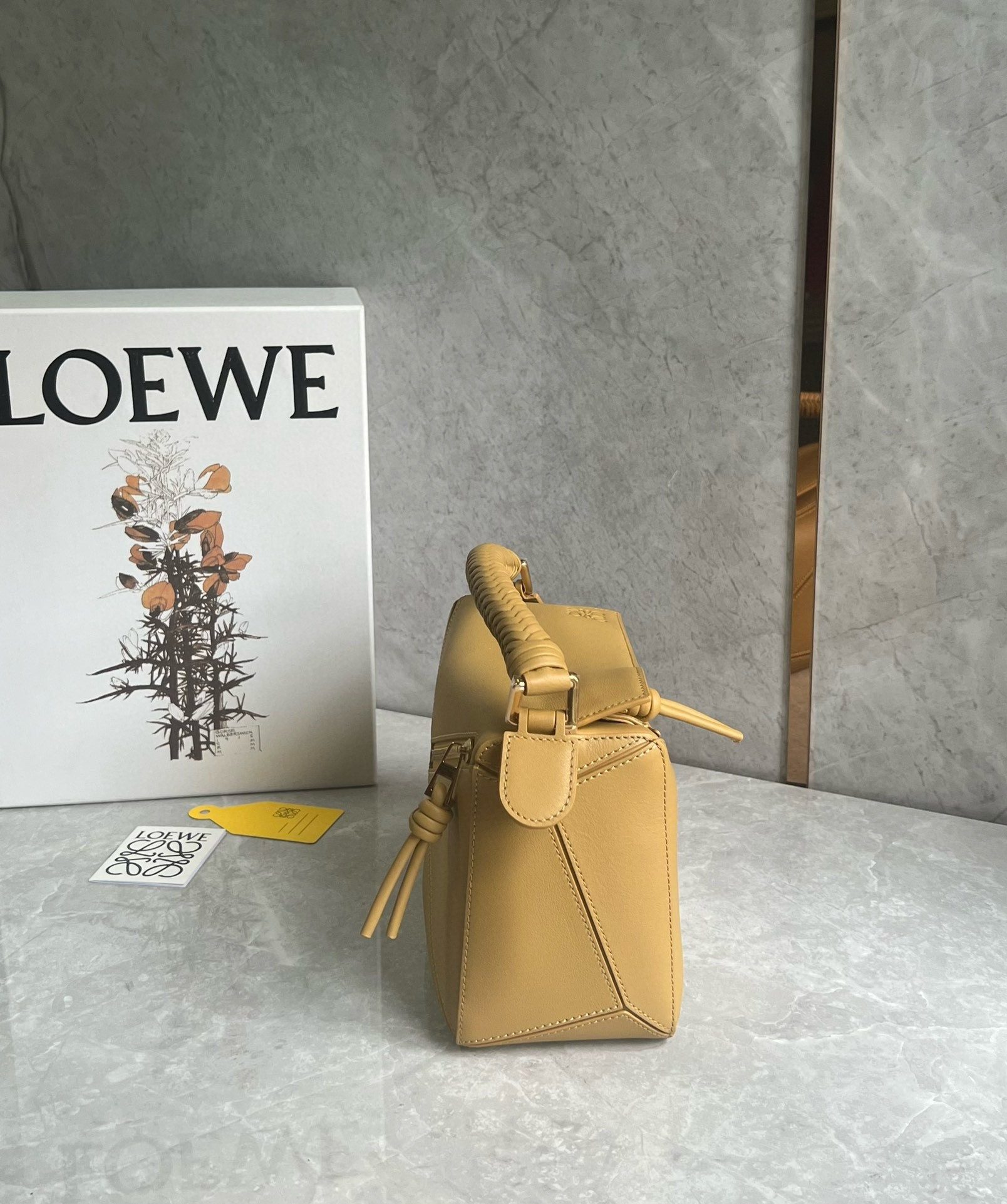 L0ew* puzzle small bag in sahara calfskin with woven handle