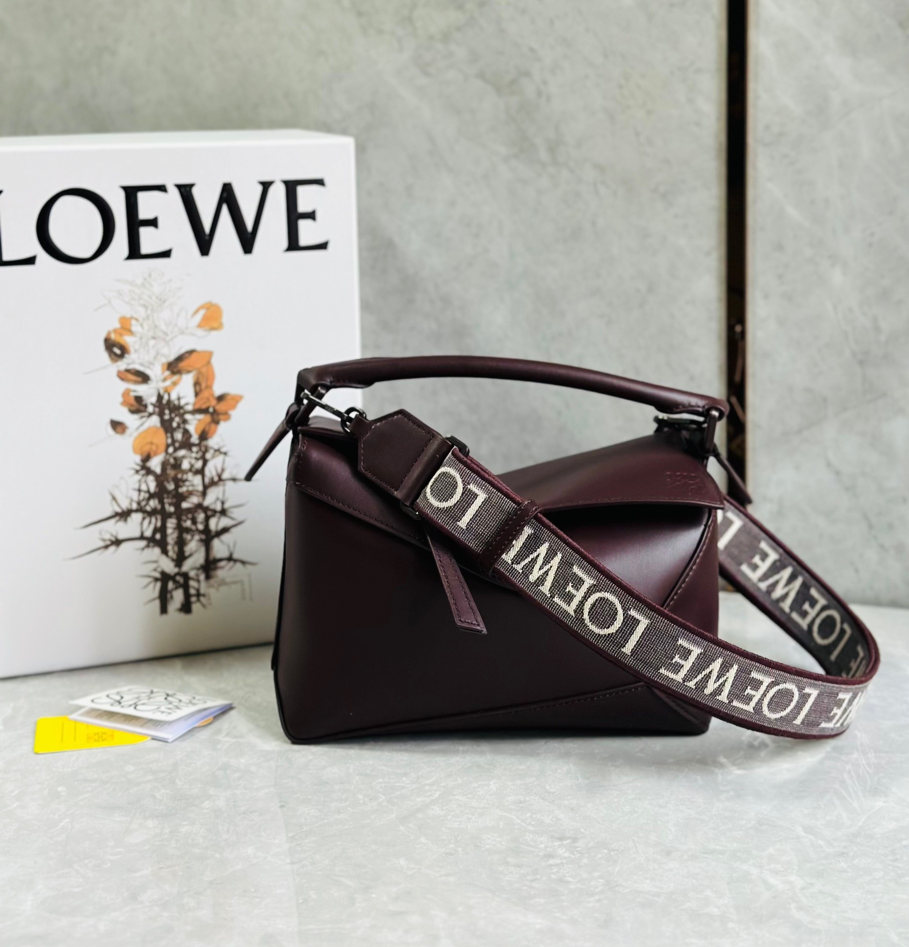 L0ew* puzzle small bag in burgundy satin calfskin
