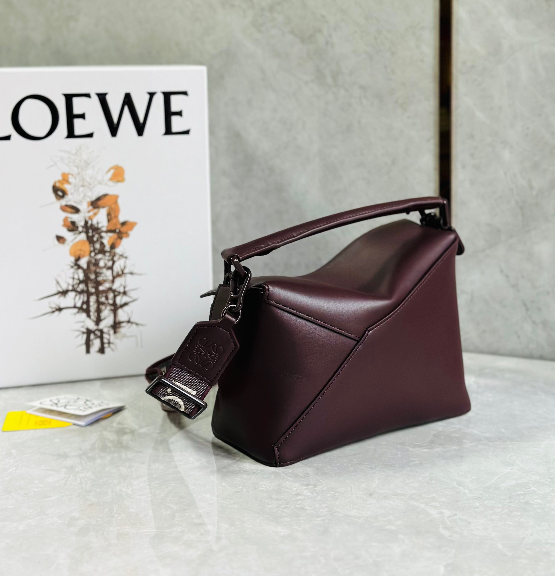 L0ew* puzzle small bag in burgundy satin calfskin