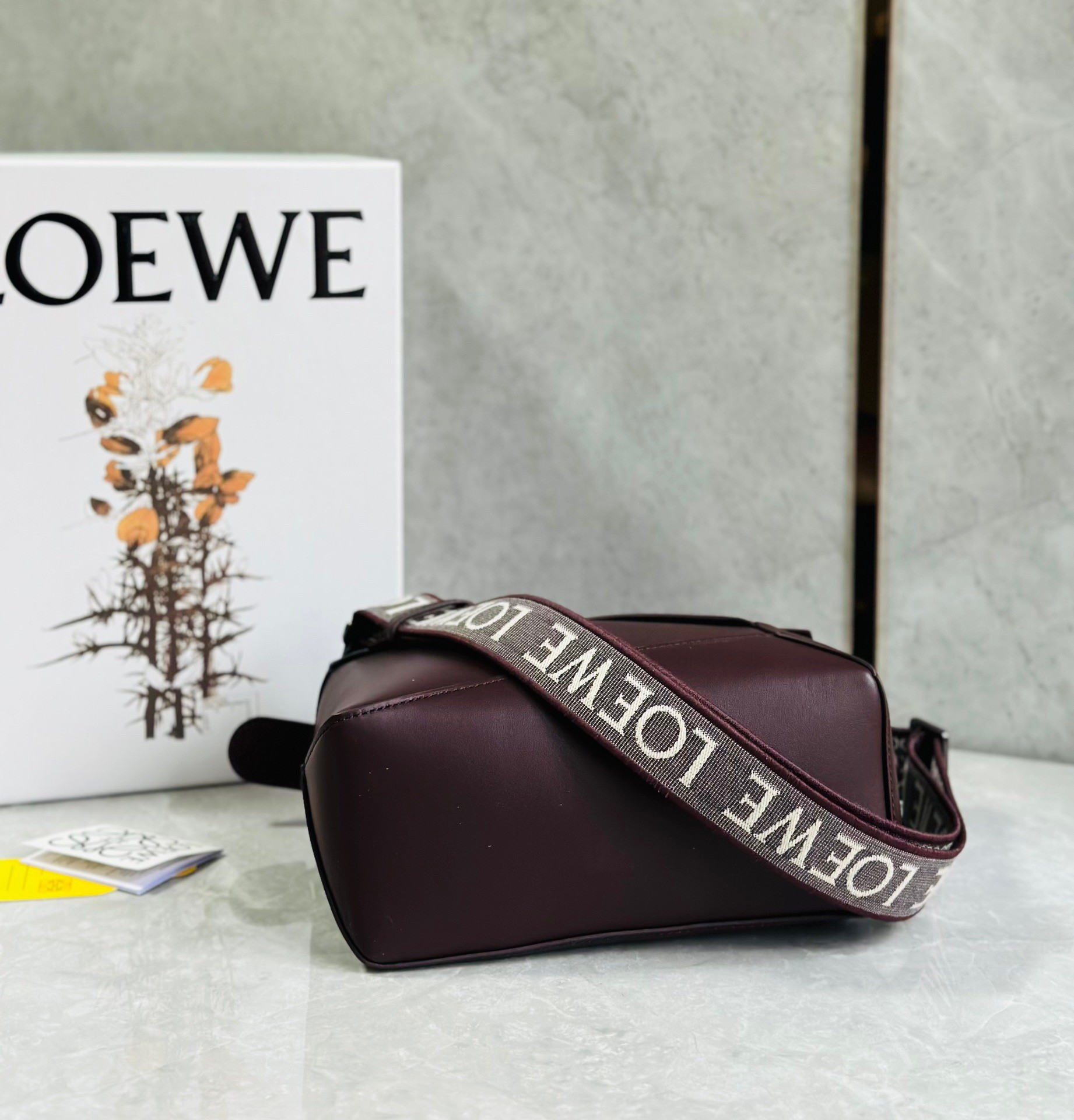 L0ew* puzzle small bag in burgundy satin calfskin