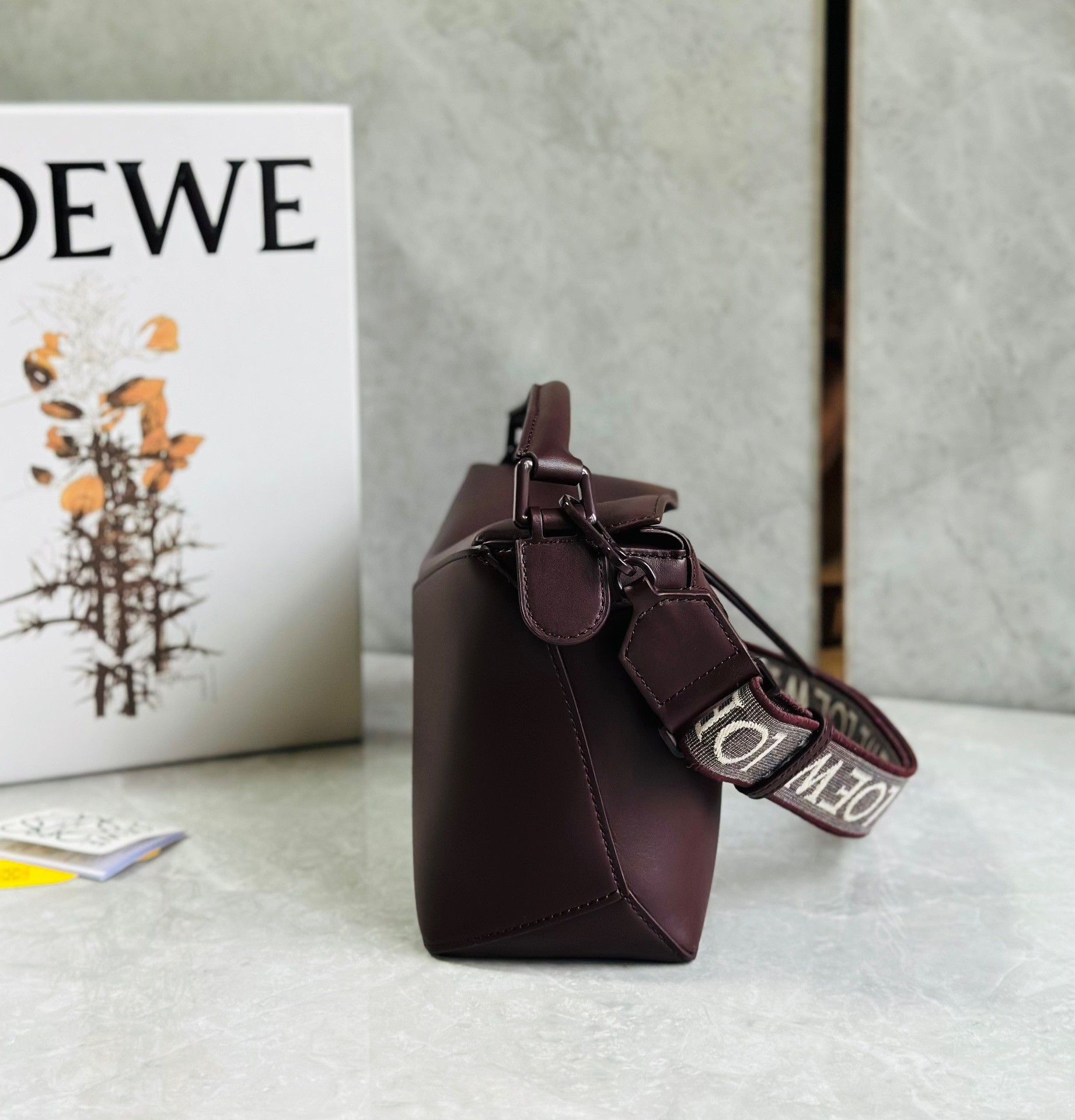 L0ew* puzzle small bag in burgundy satin calfskin