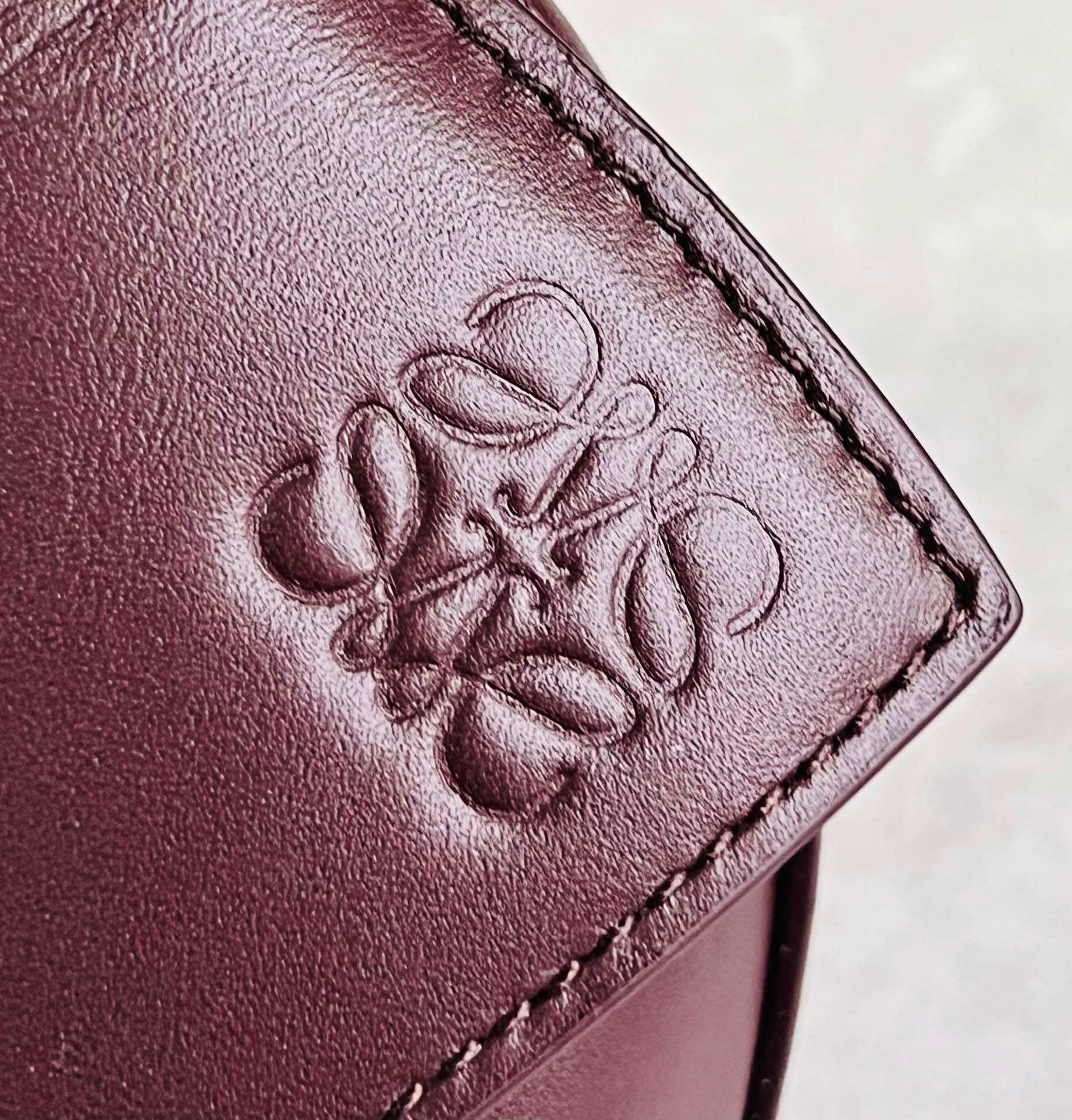 L0ew* puzzle small bag in burgundy satin calfskin