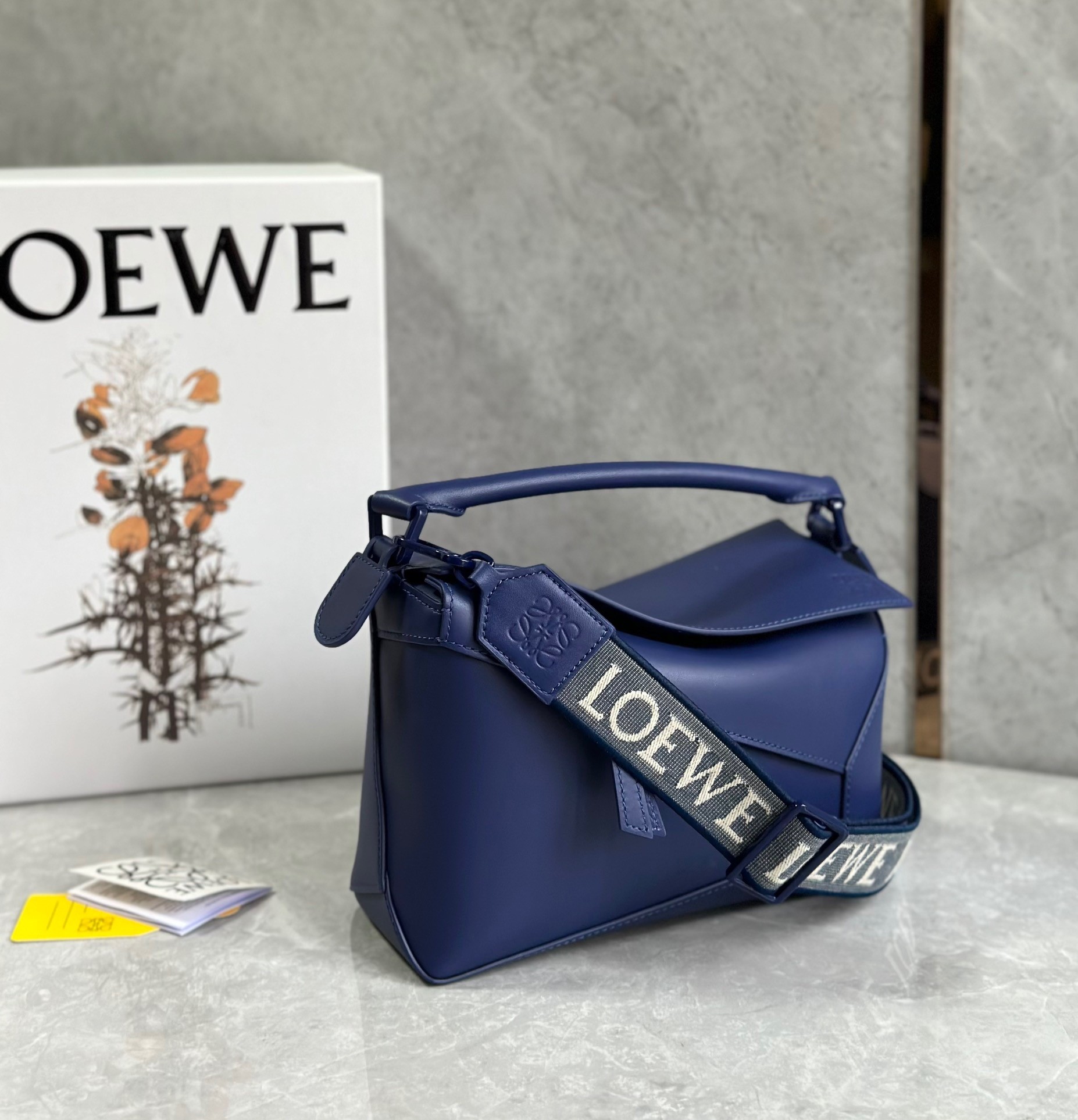 L0ew* puzzle edge small bag in deep purple satin calfskin