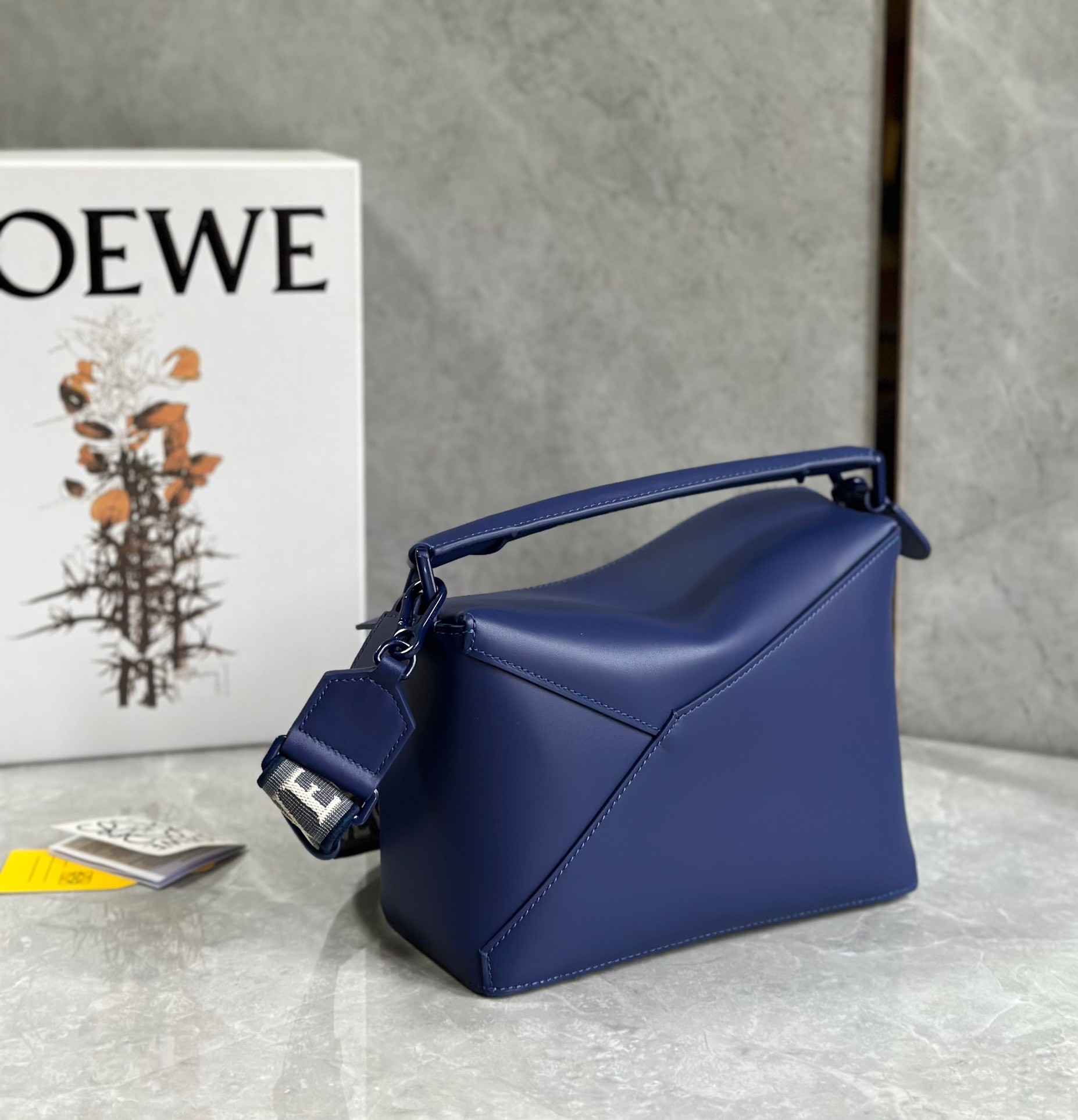 L0ew* puzzle edge small bag in deep purple satin calfskin
