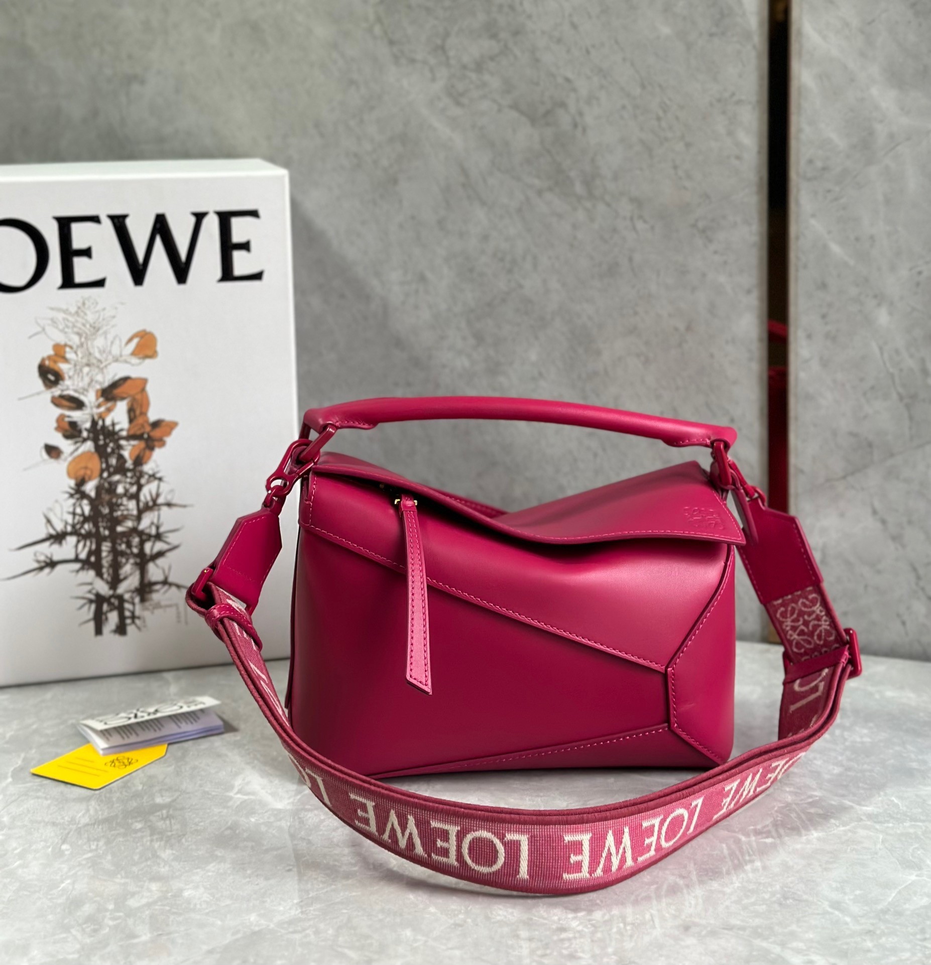 L0ew* puzzle edge small bag in ruby red satin calfskin